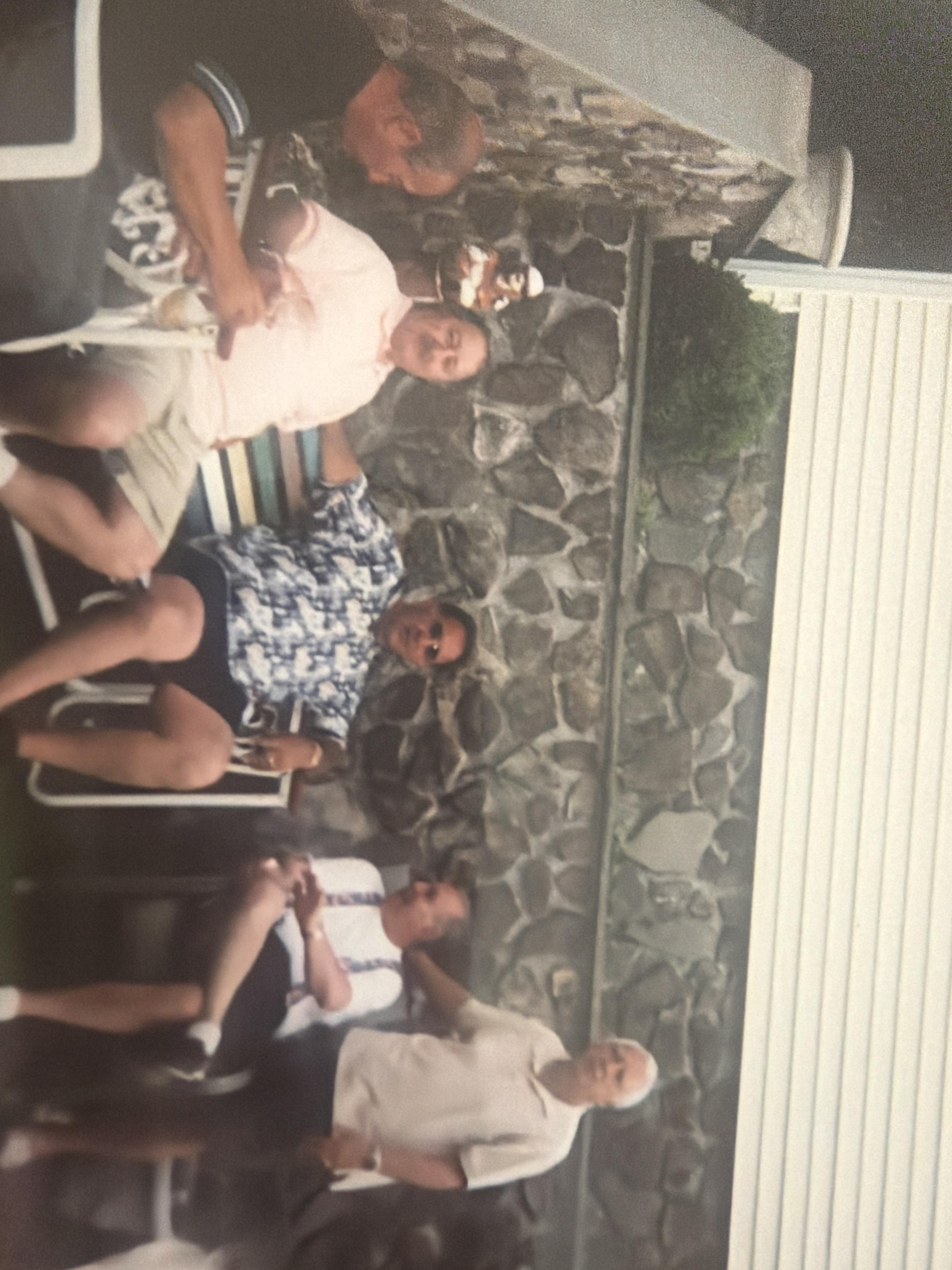 A group of people sitting on chairs