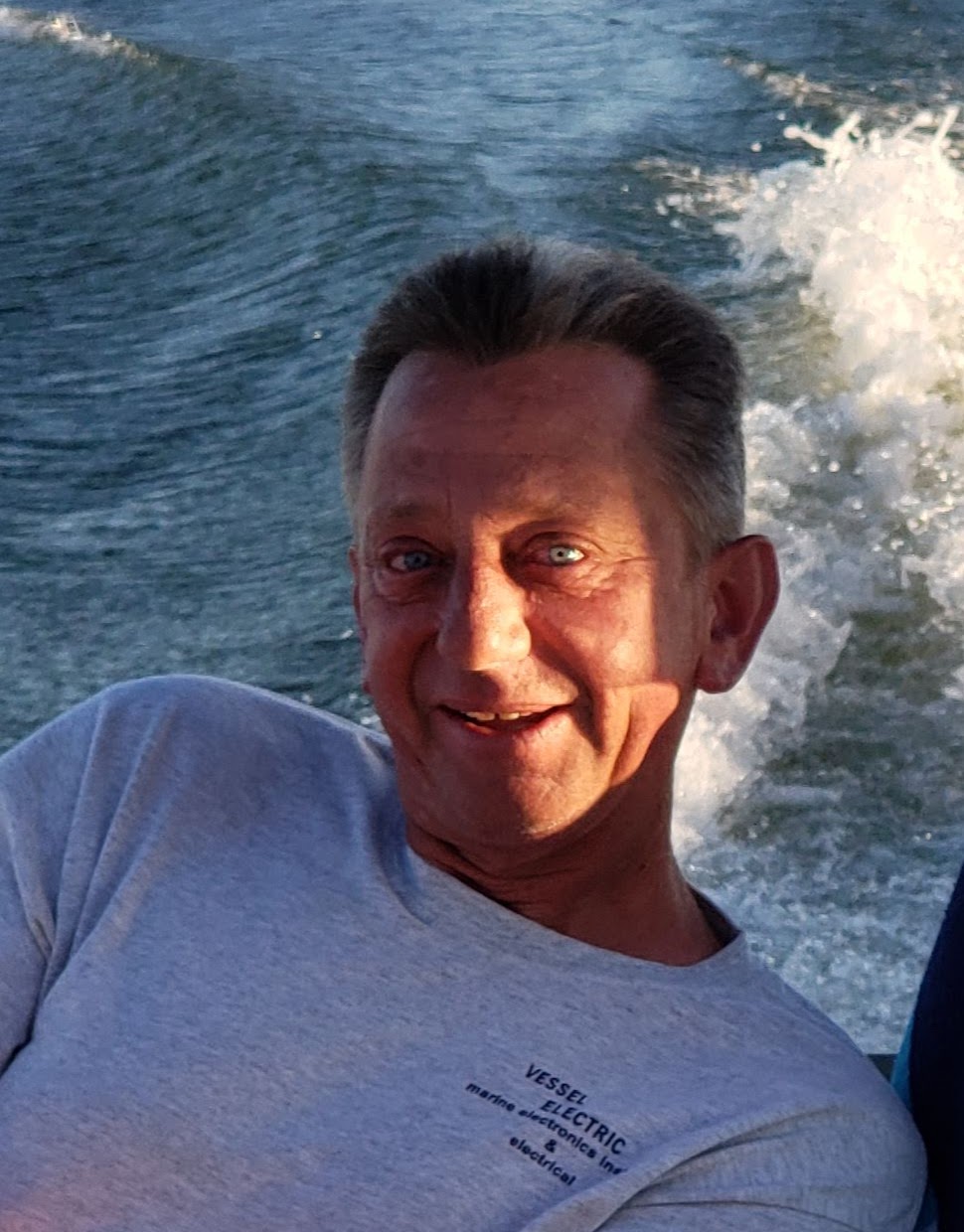A man smiling at the camera