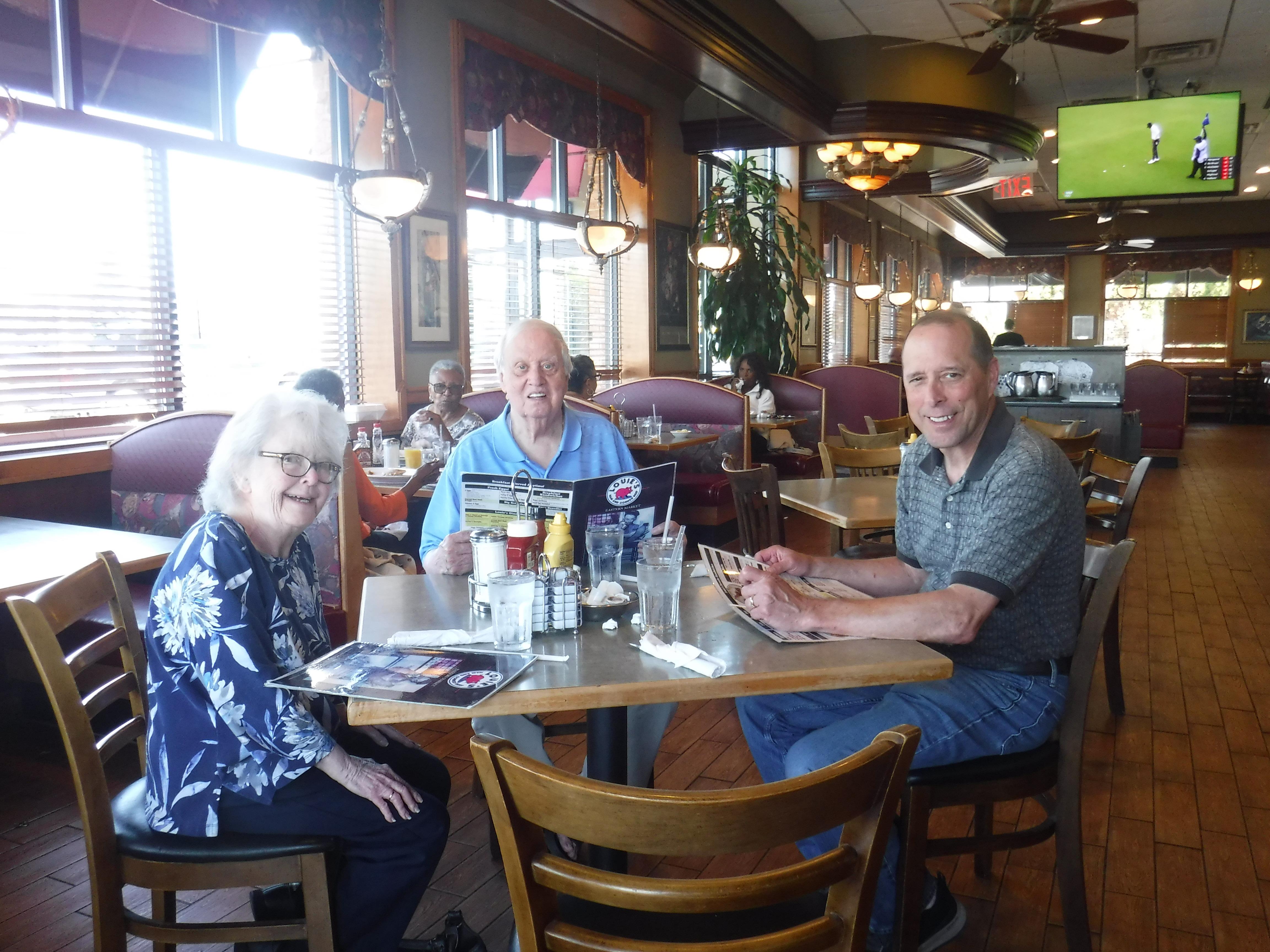 A group of people sitting at a table