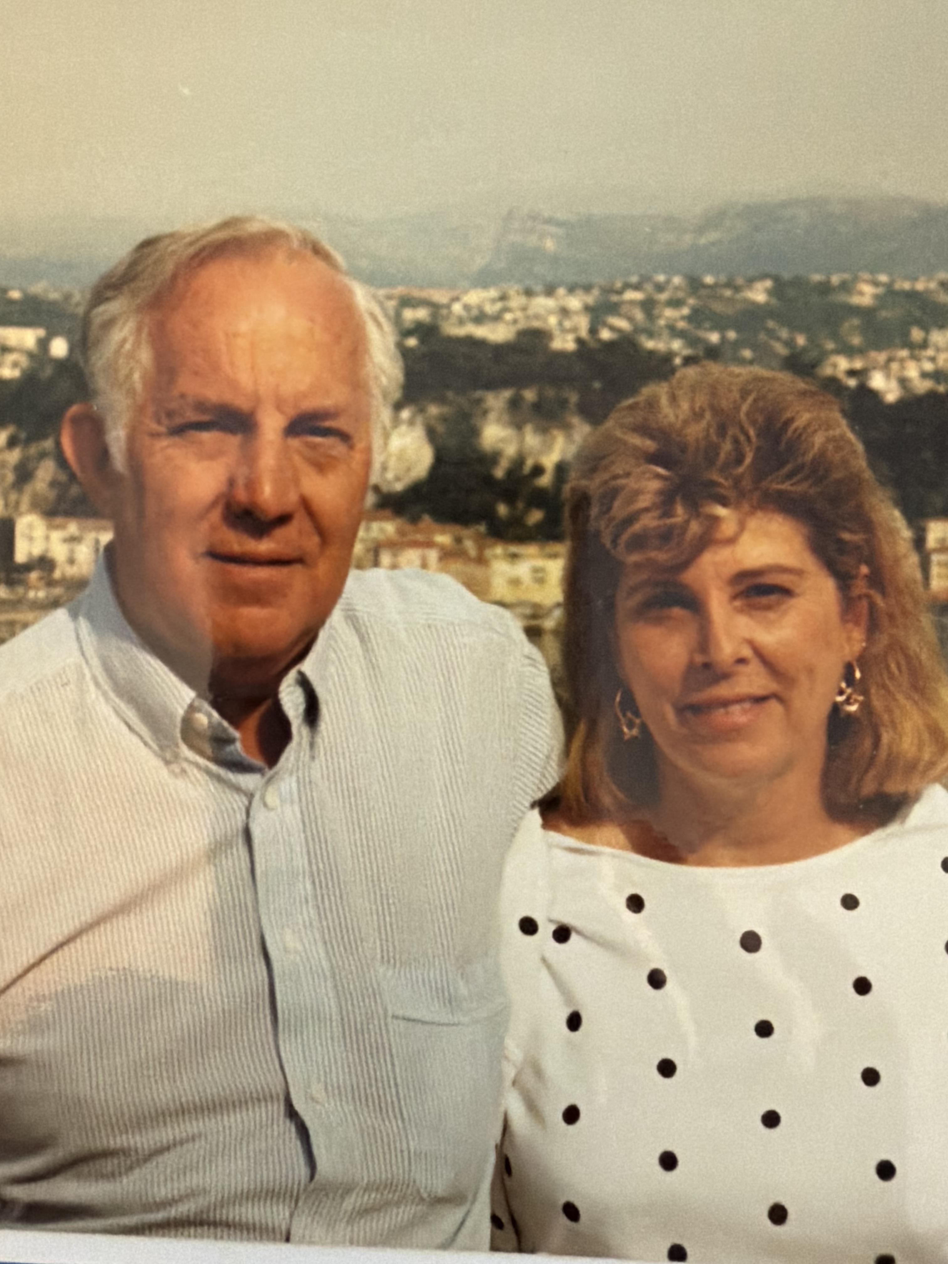 A man and woman posing for a picture