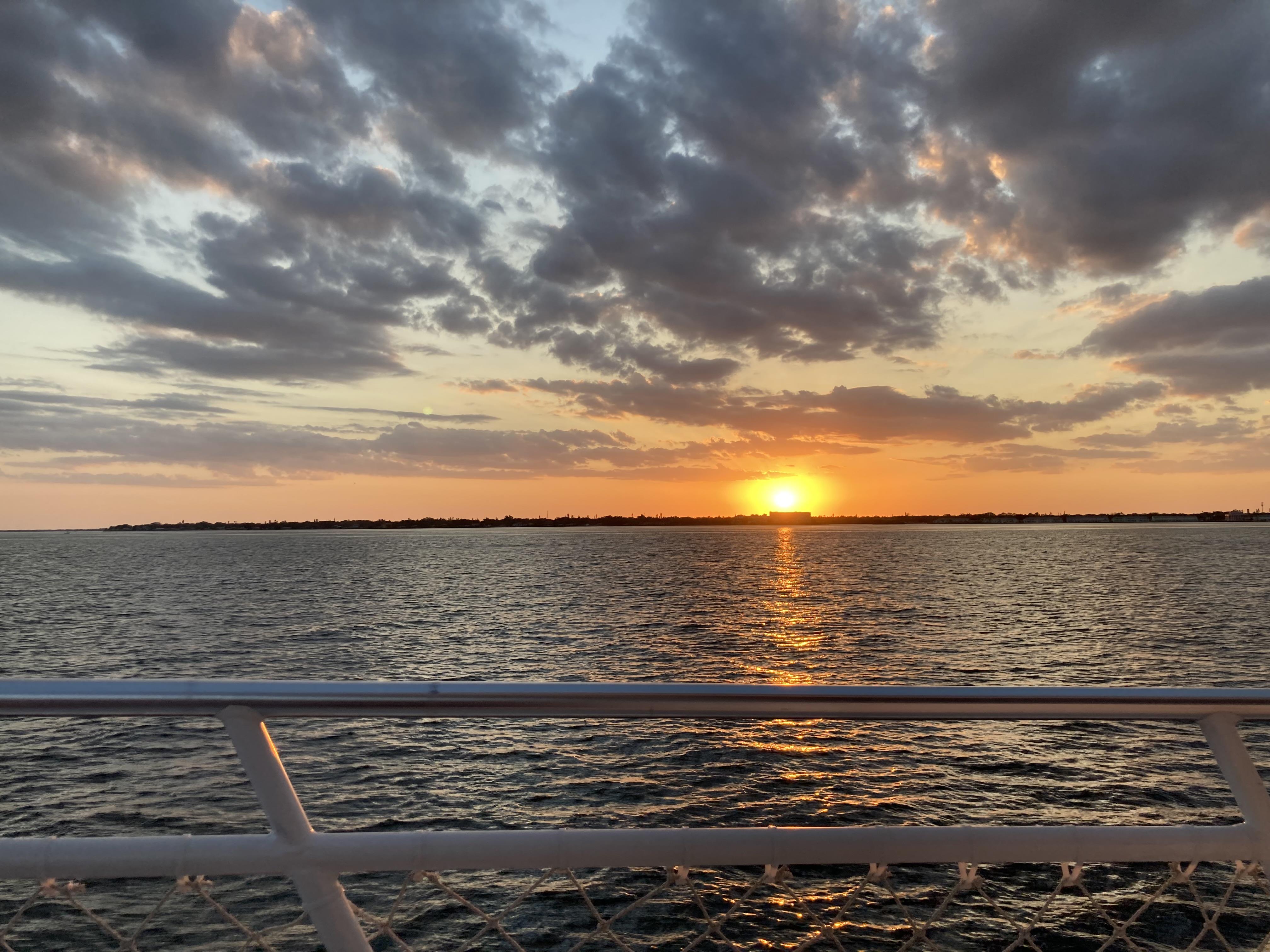 A sunset over a body of water