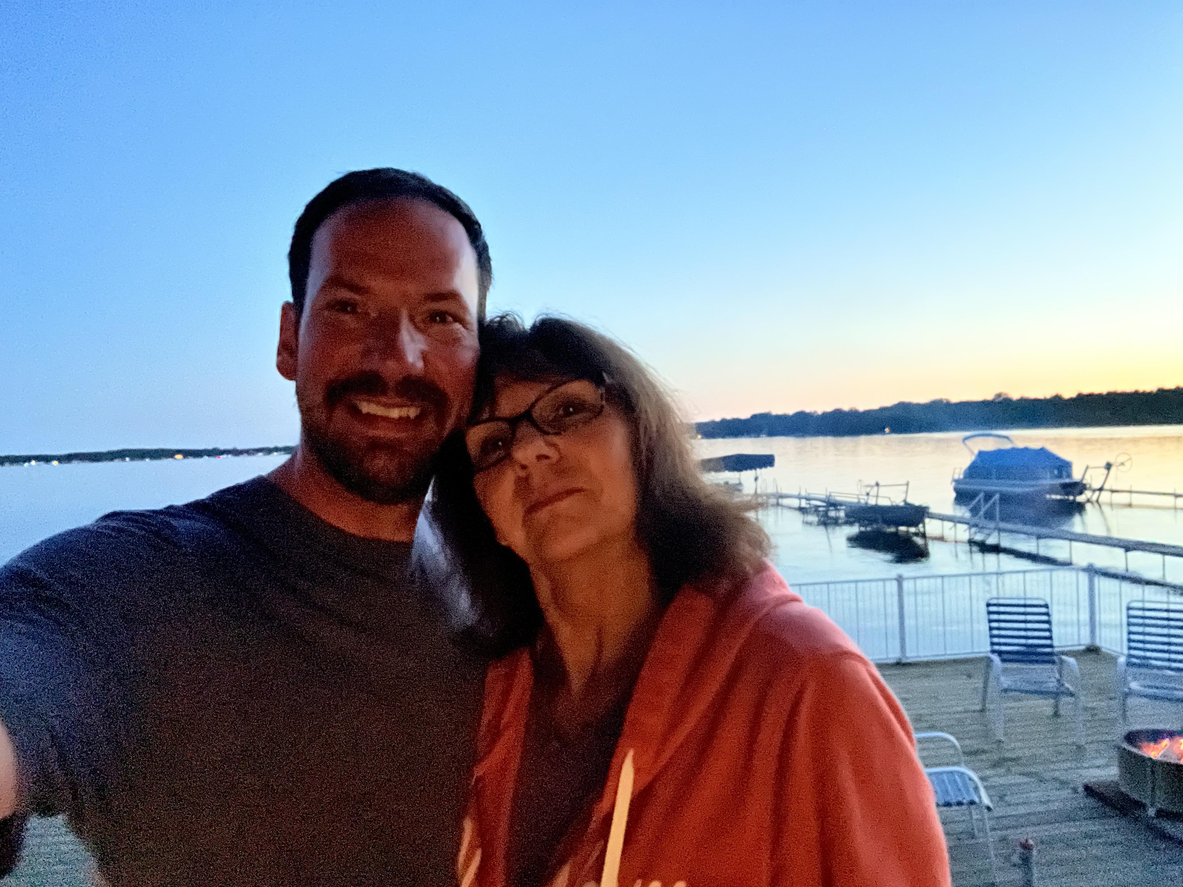 A man and woman taking a selfie