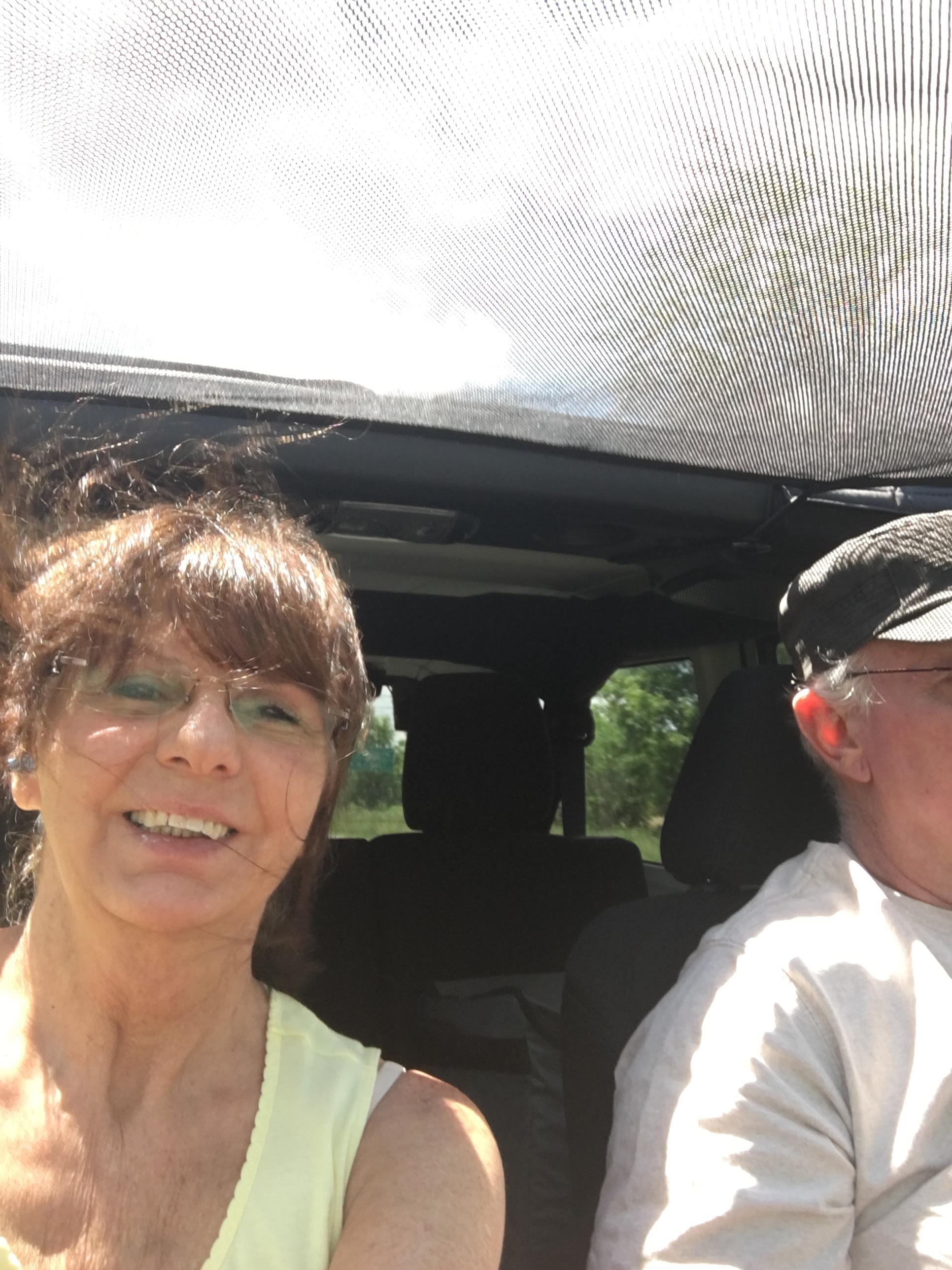 A man and woman in a car
