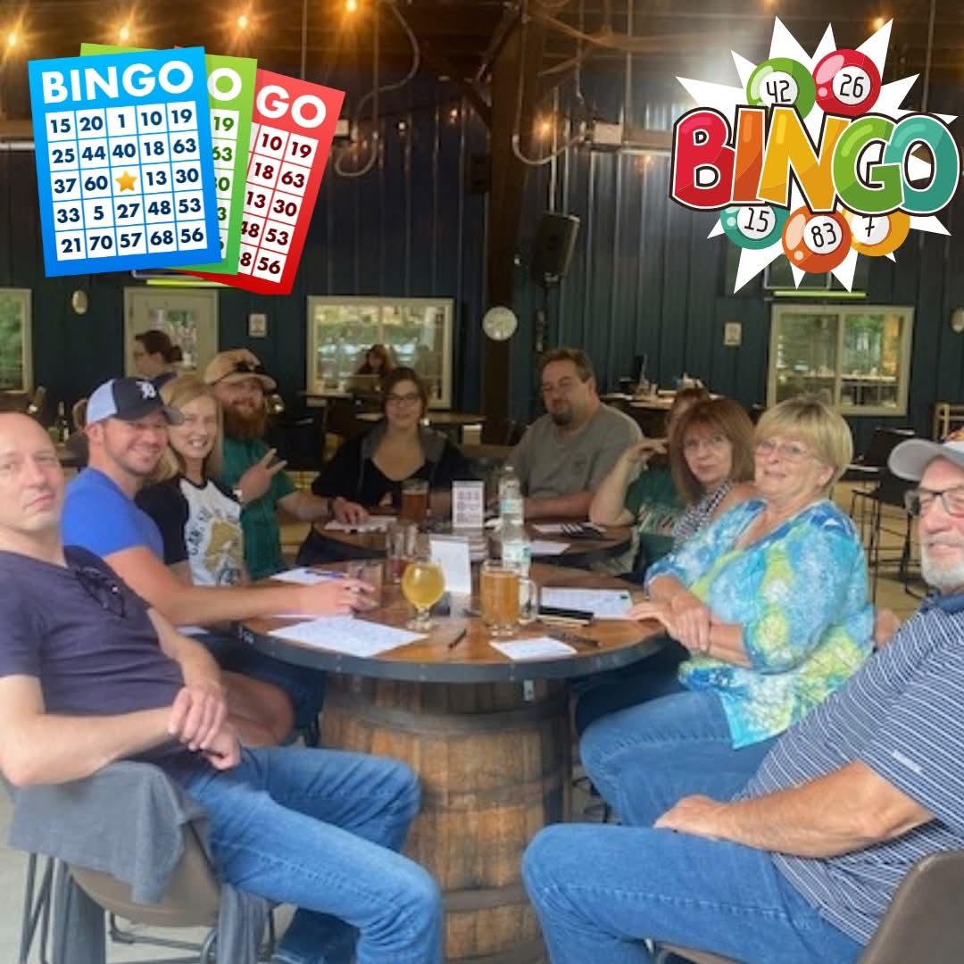 A group of people sitting around a table