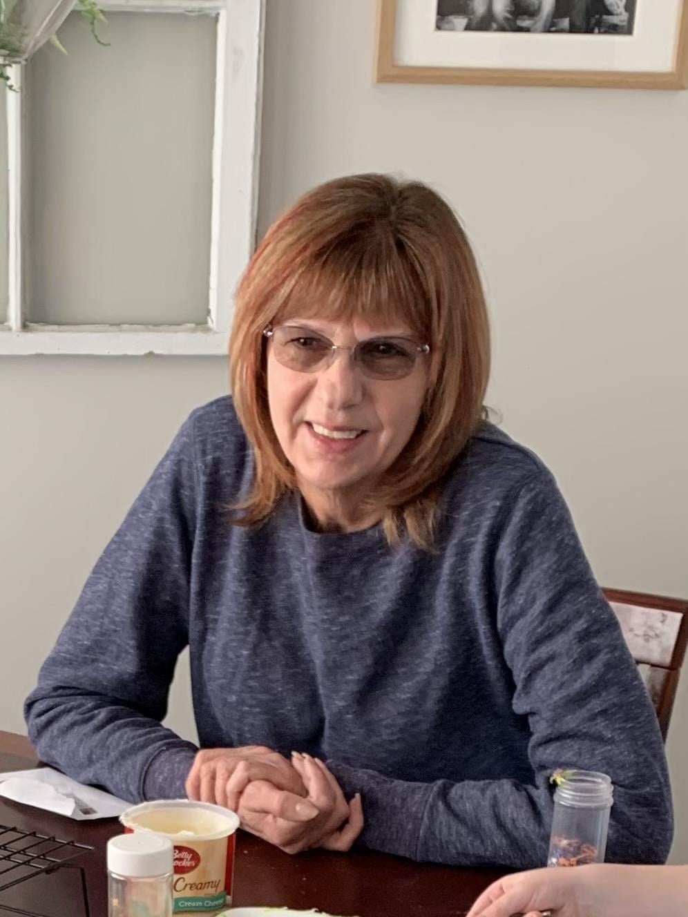 A woman sitting at a table
