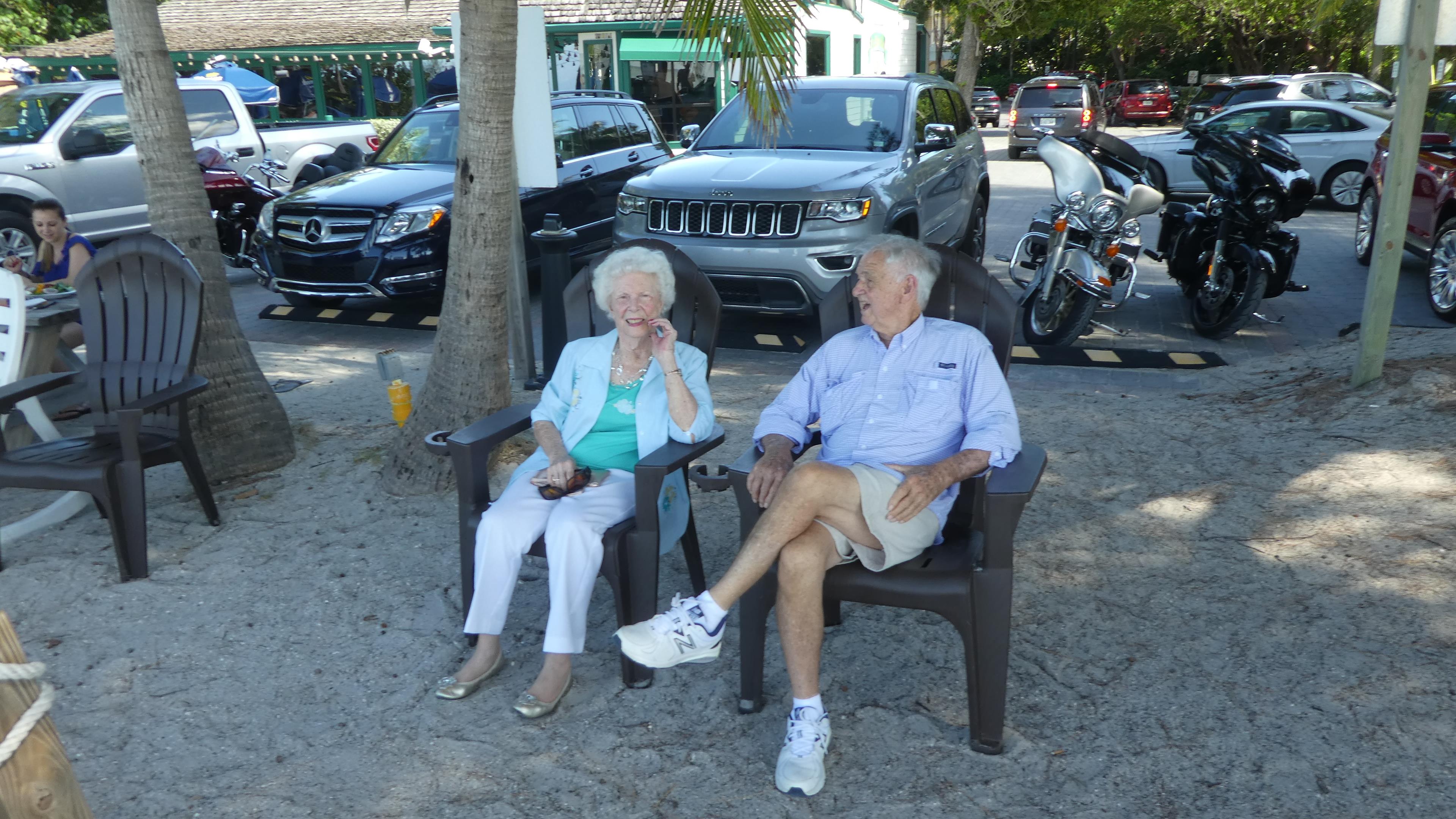 A man and woman sitting in chairs