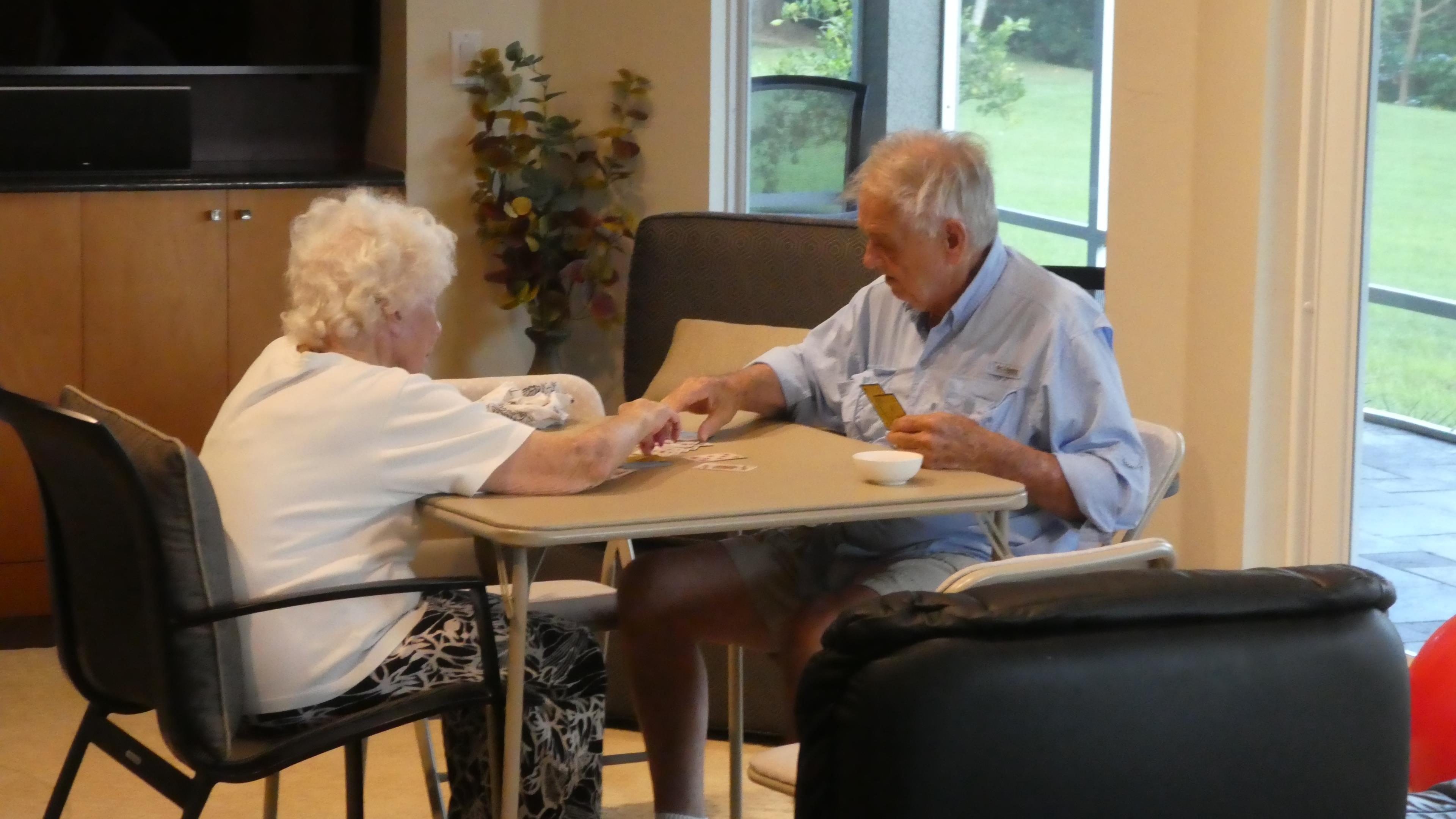 A man and woman sitting at a table
