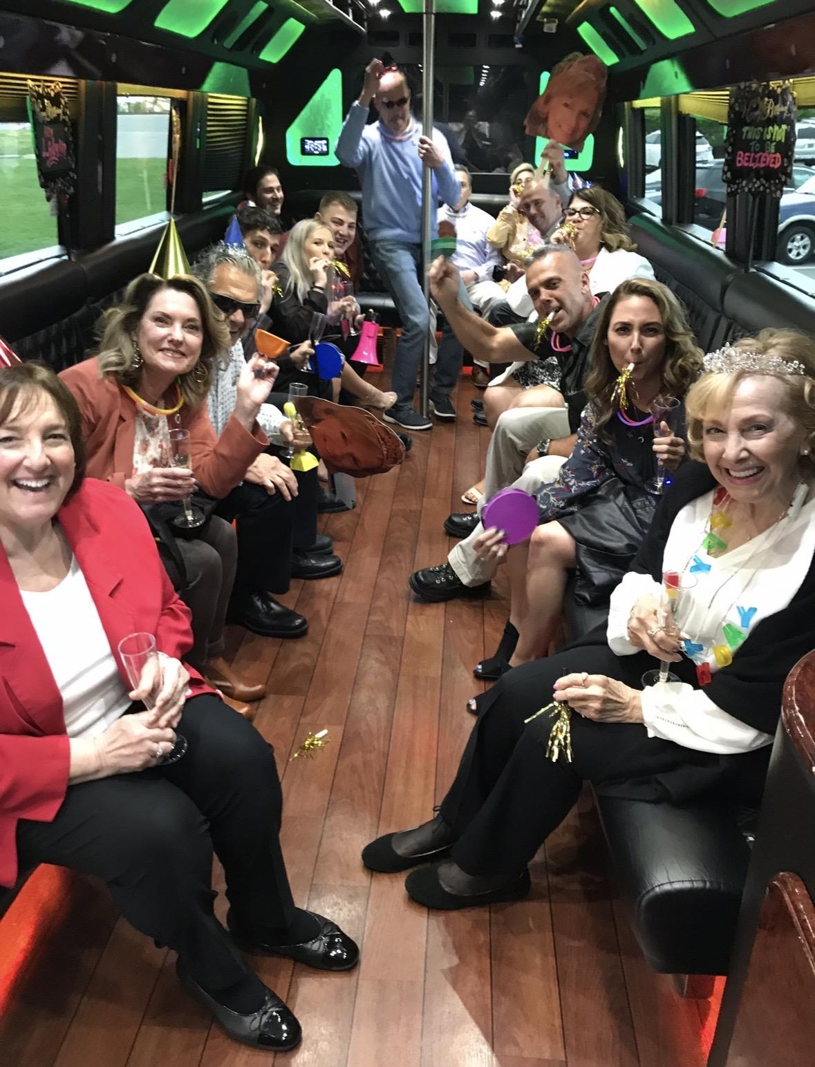A group of people sitting in a bus