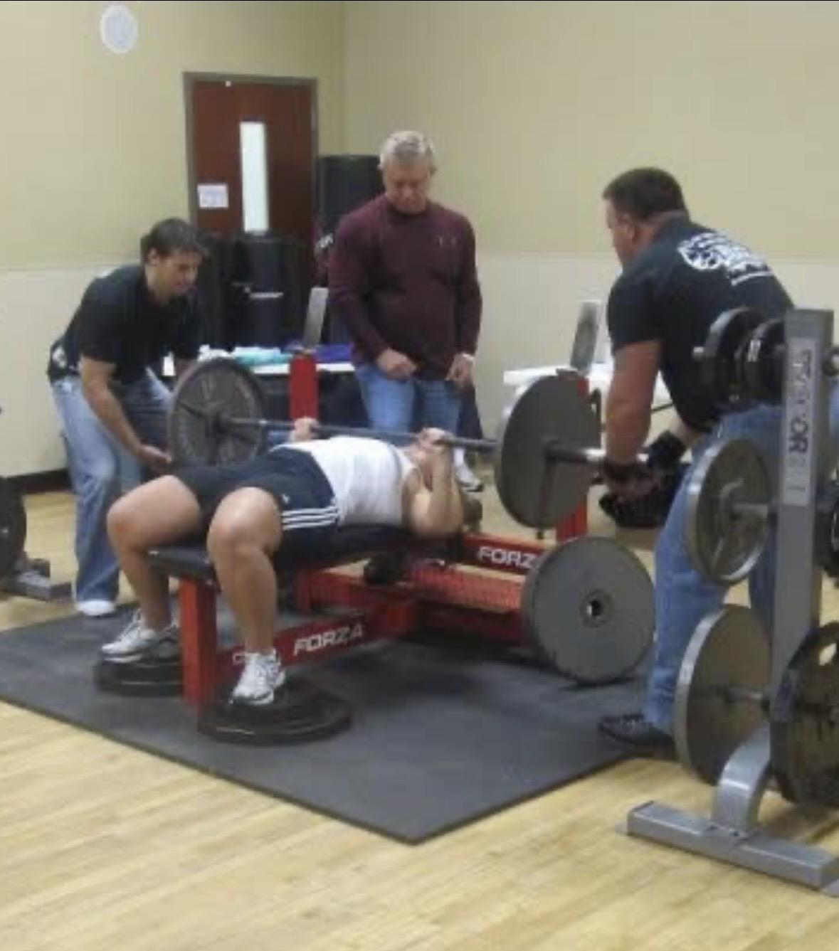 A group of men working out in a gym