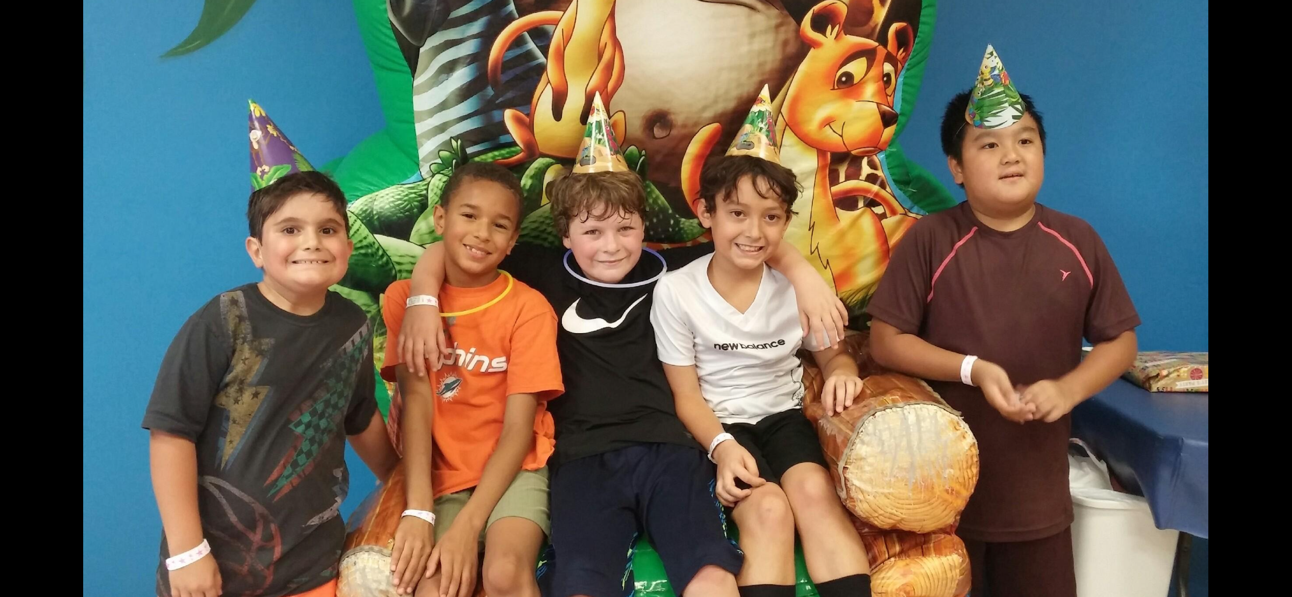 A group of boys sitting on a couch