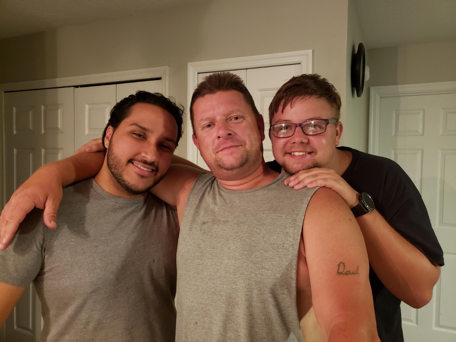 A group of men posing for a picture