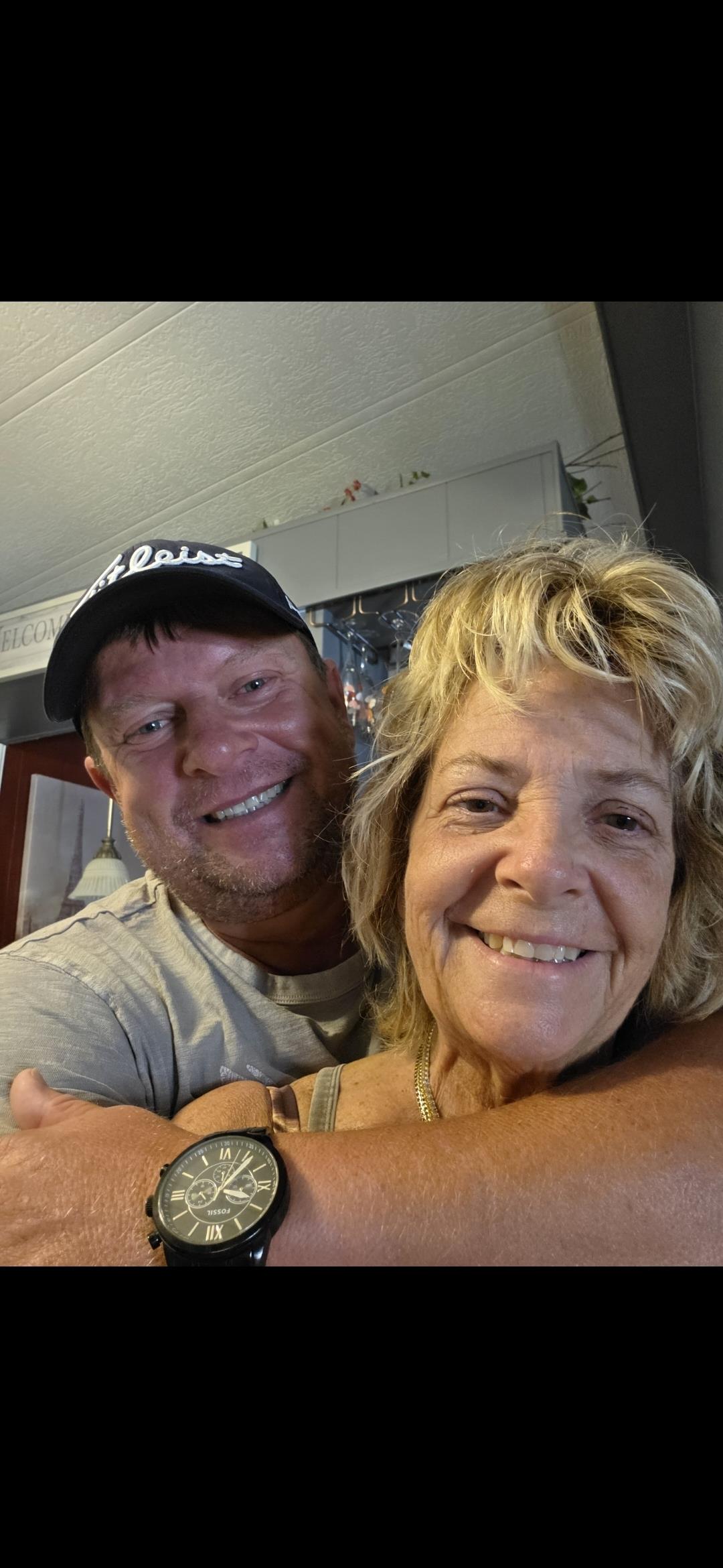 A man and woman taking a selfie