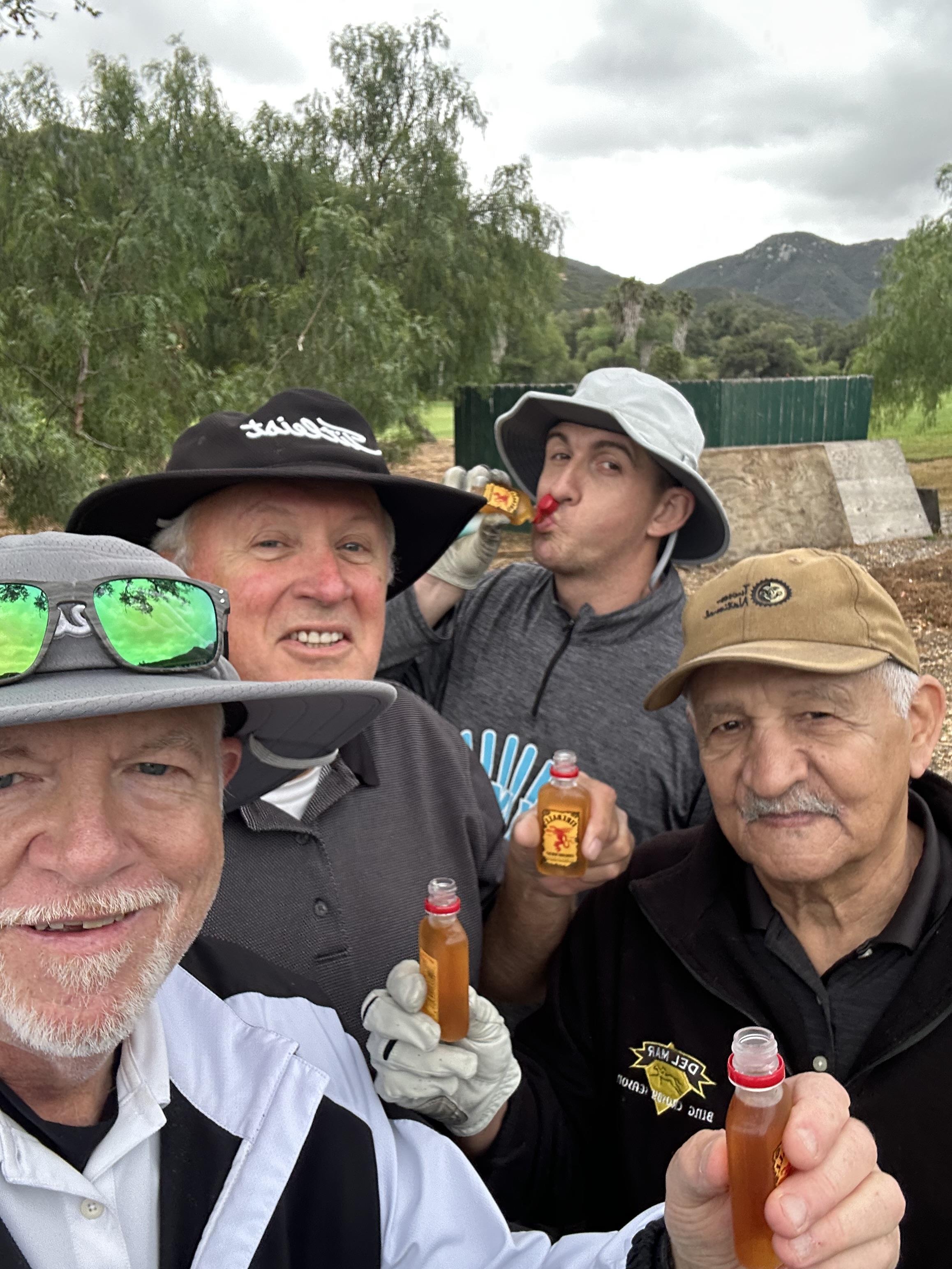 A group of men taking a selfie