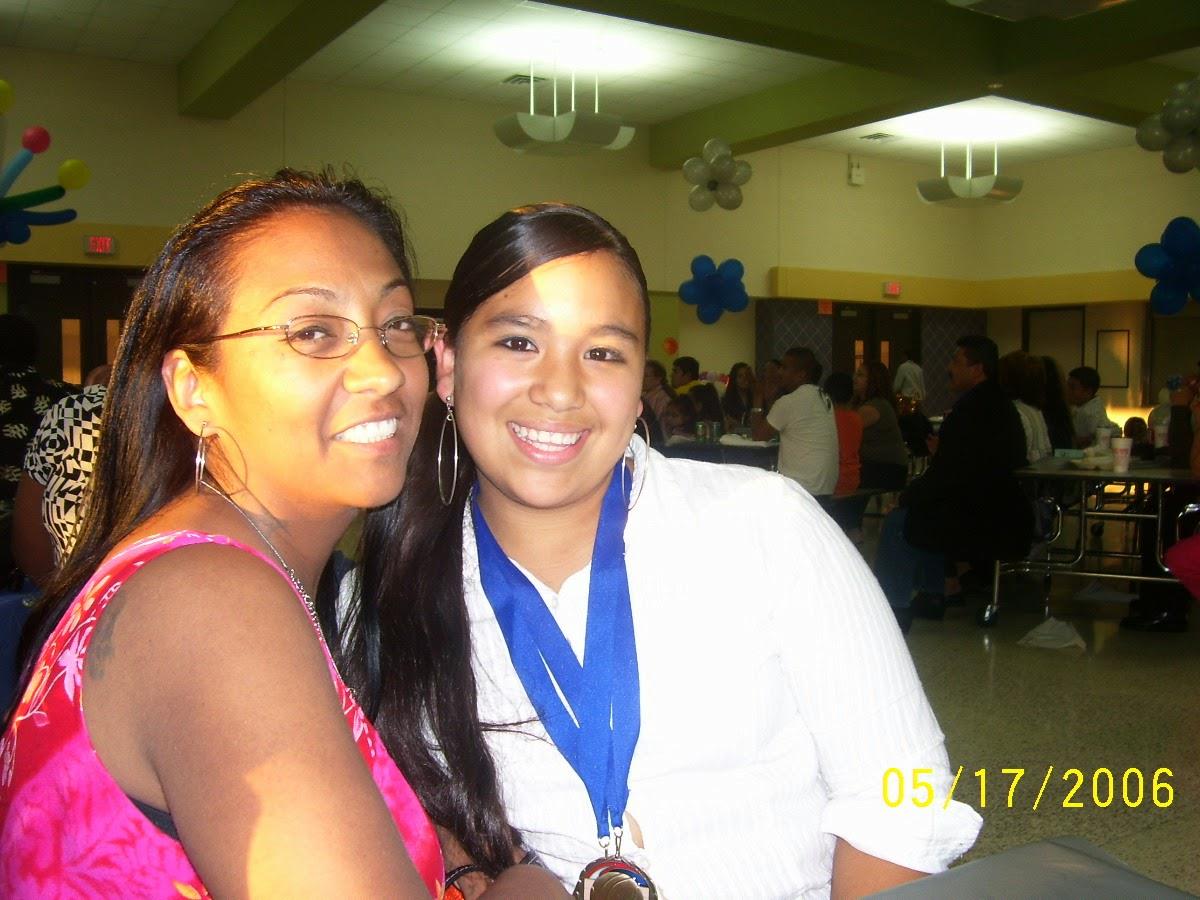 A couple of women smiling at the camera