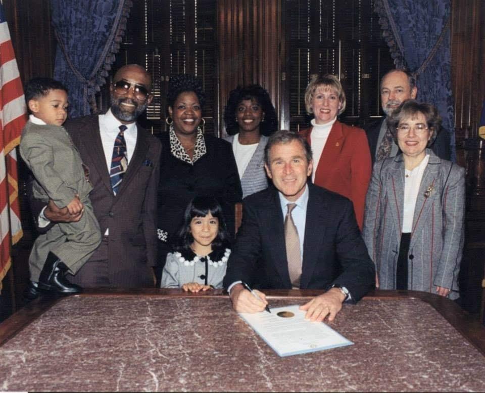 A group of people posing for a photo