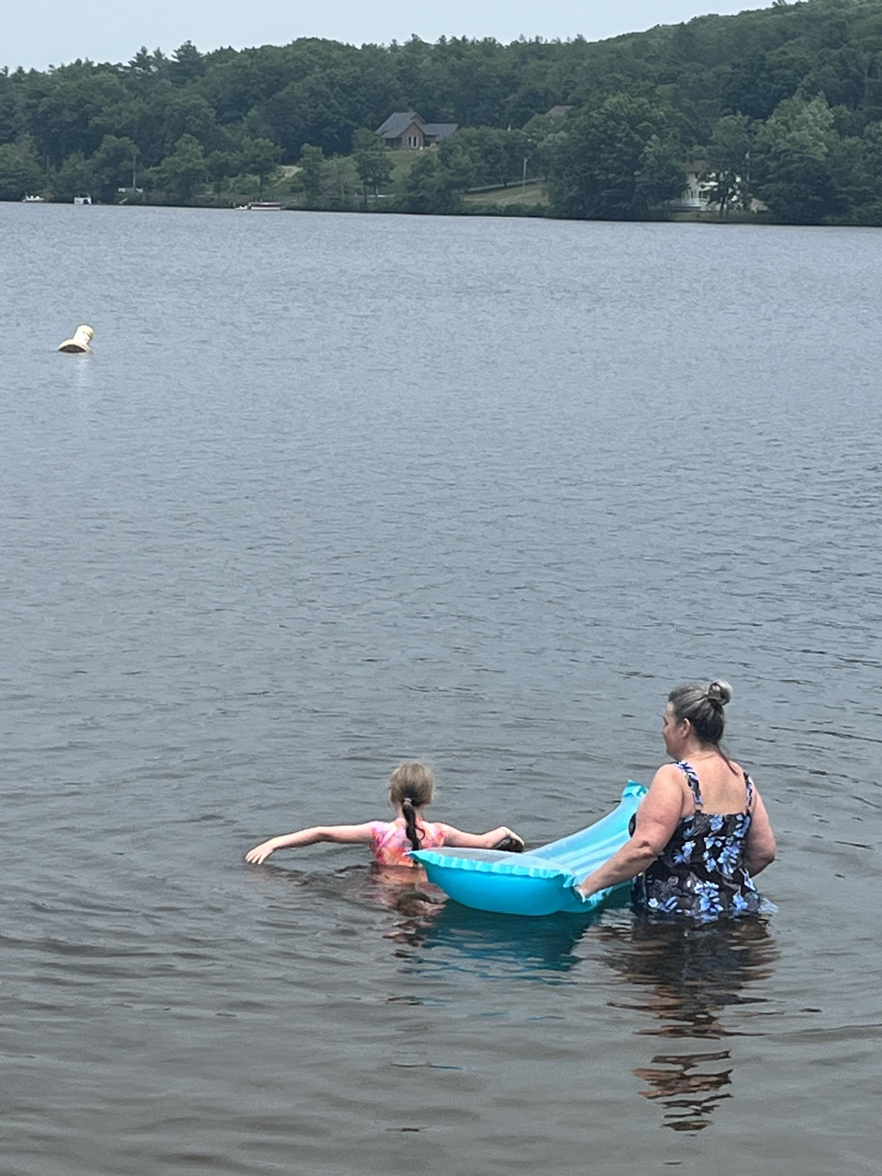 A woman and a girl in the water