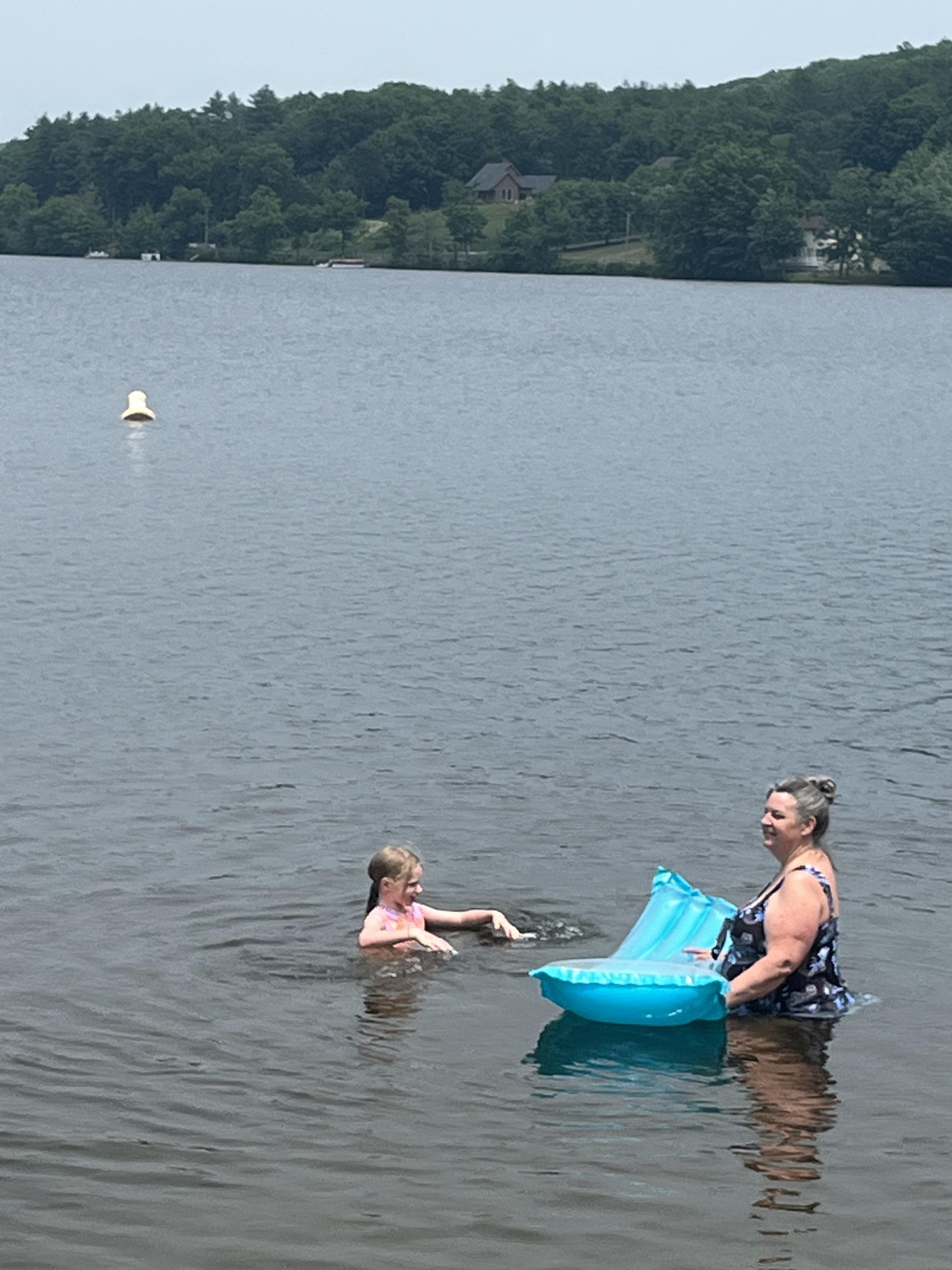 A woman and a girl in the water