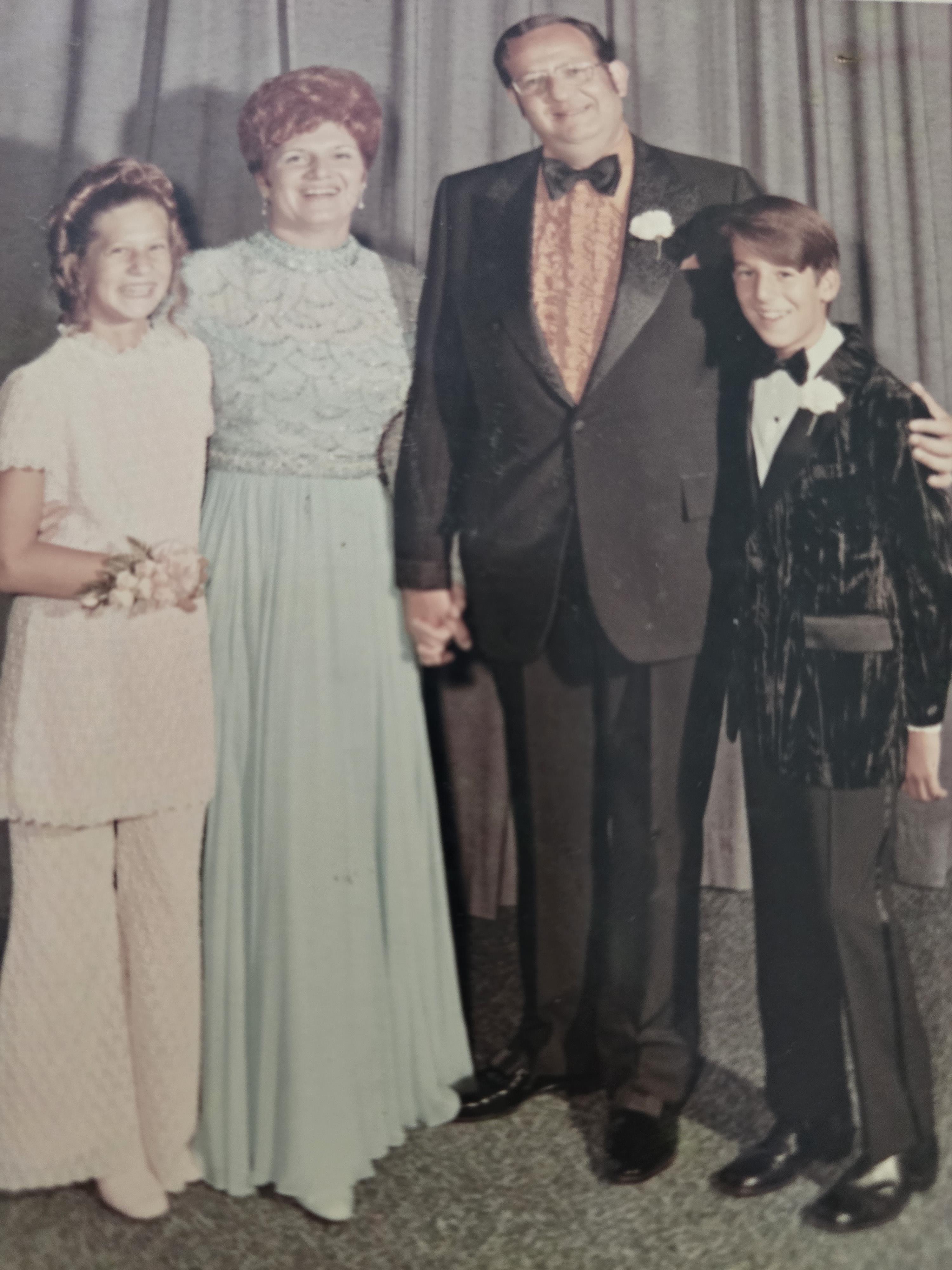 A man and woman posing for a picture