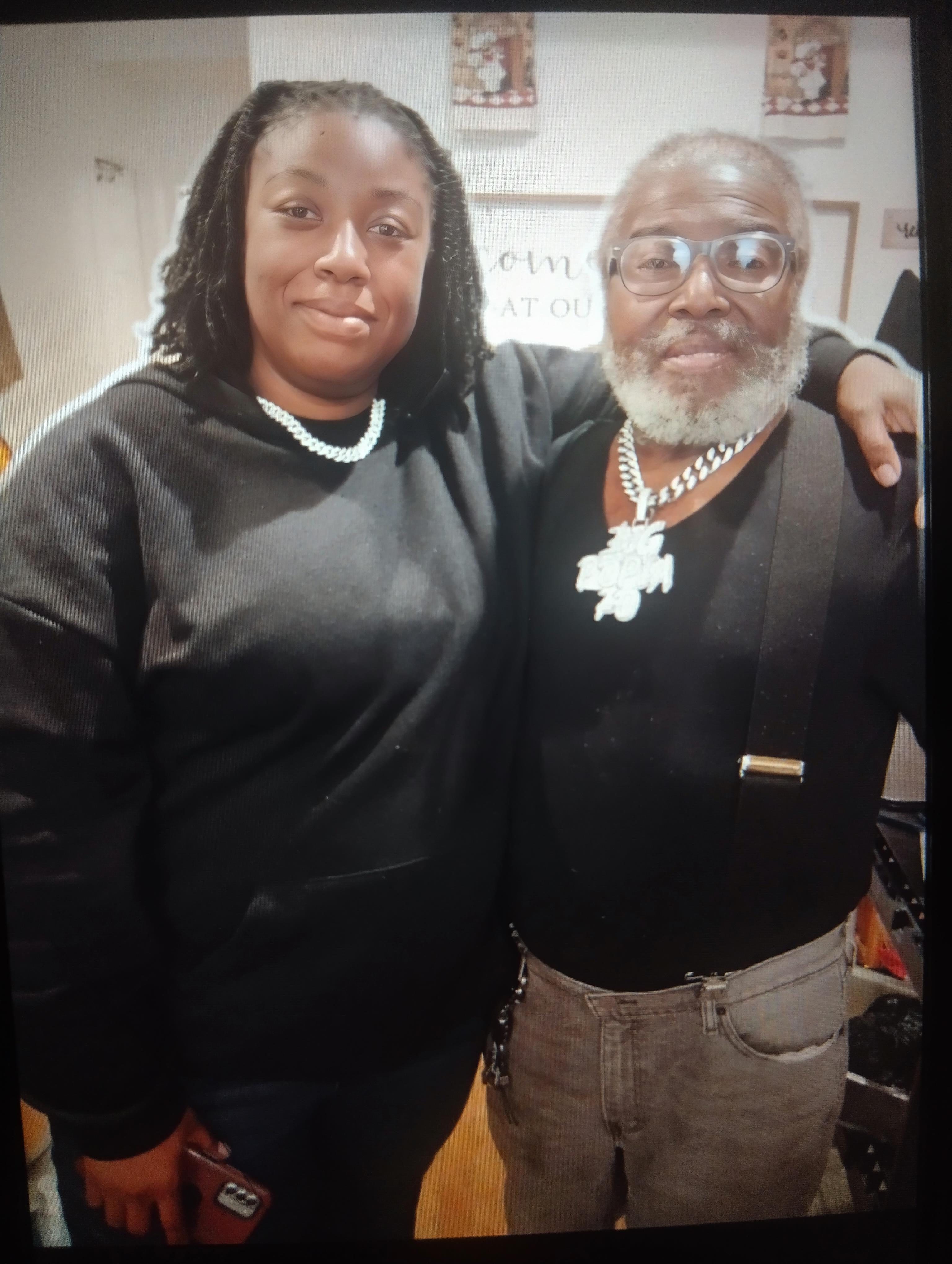 A man and woman posing for a picture