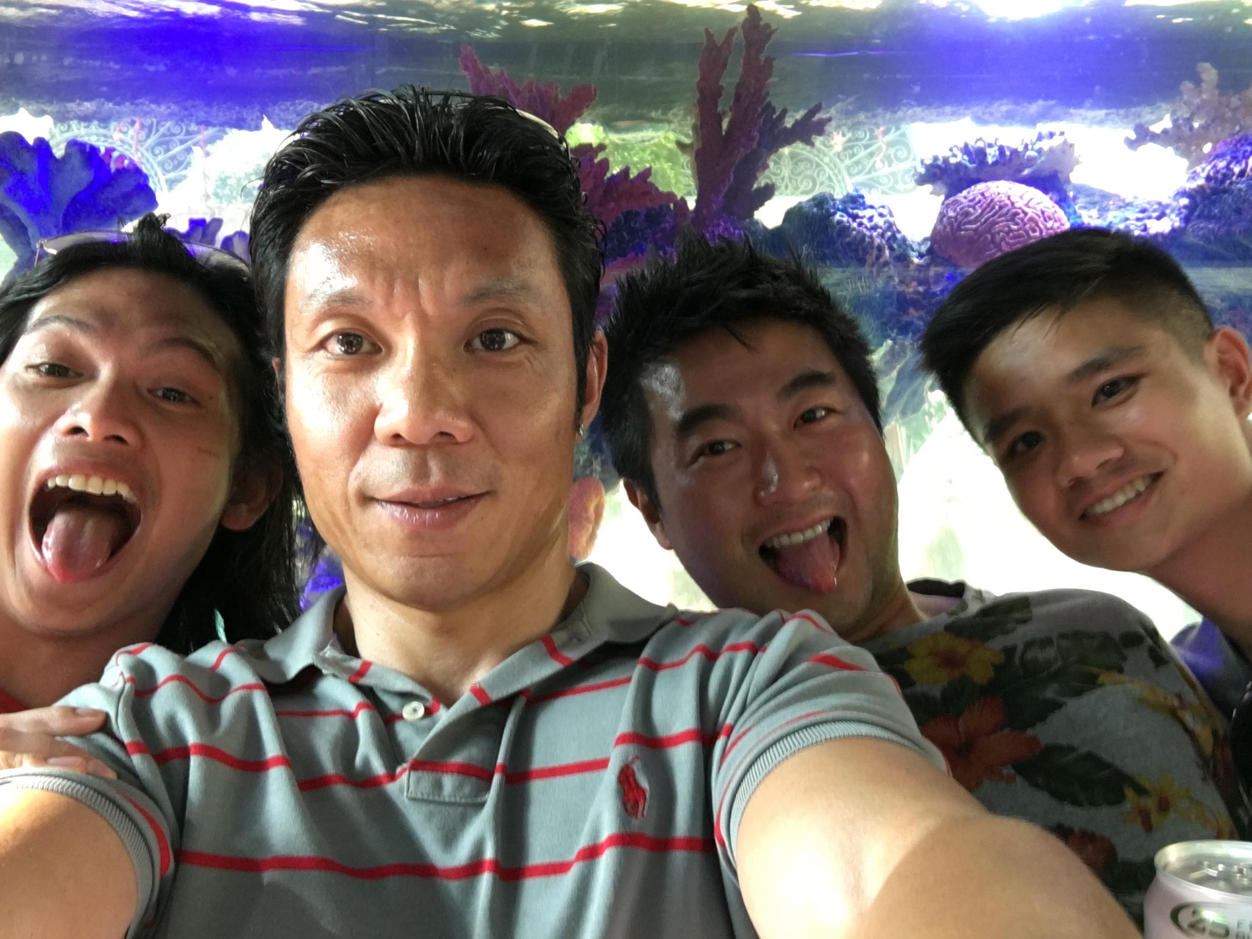 A group of people taking a selfie