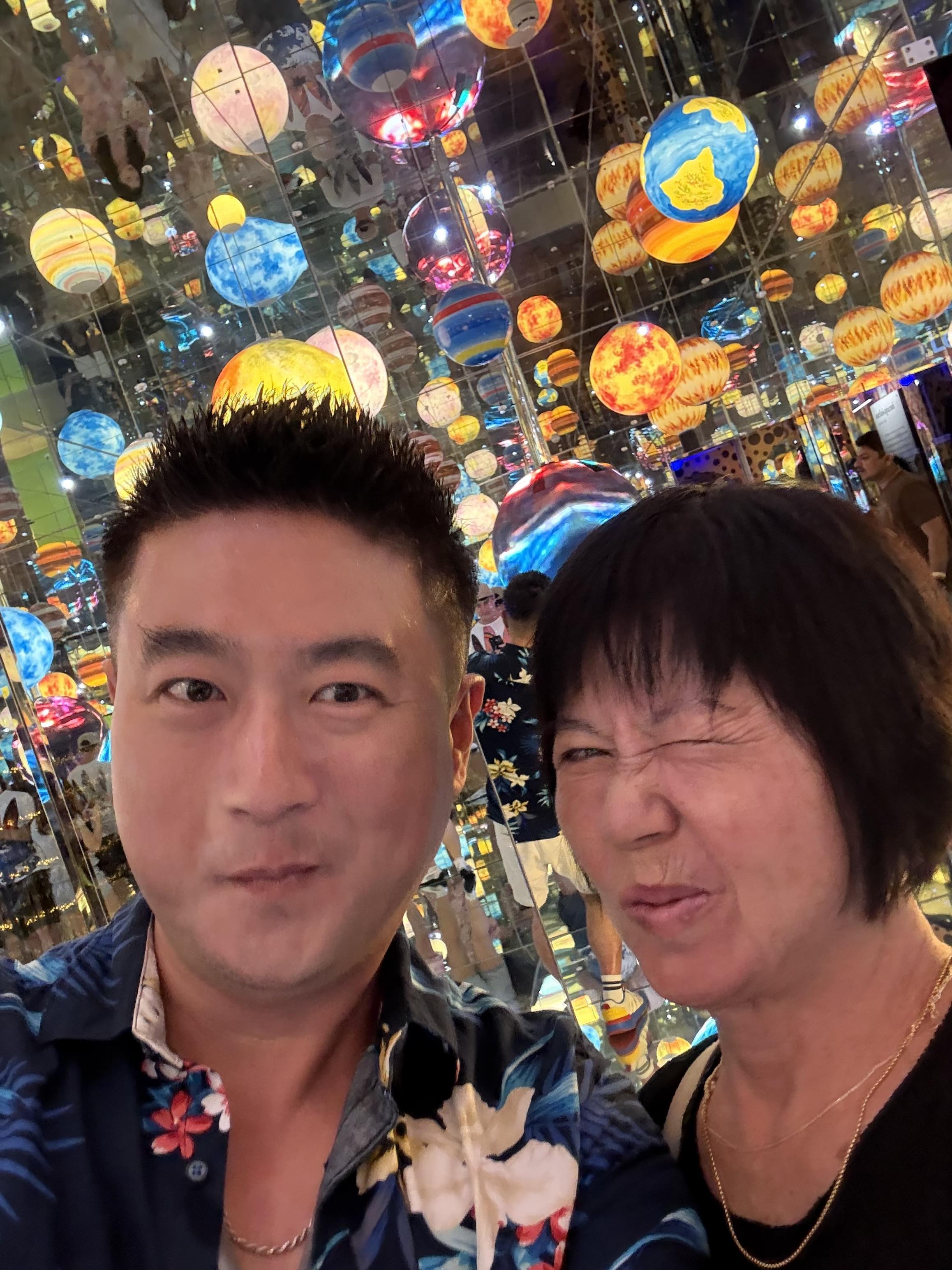 A man and woman taking a selfie