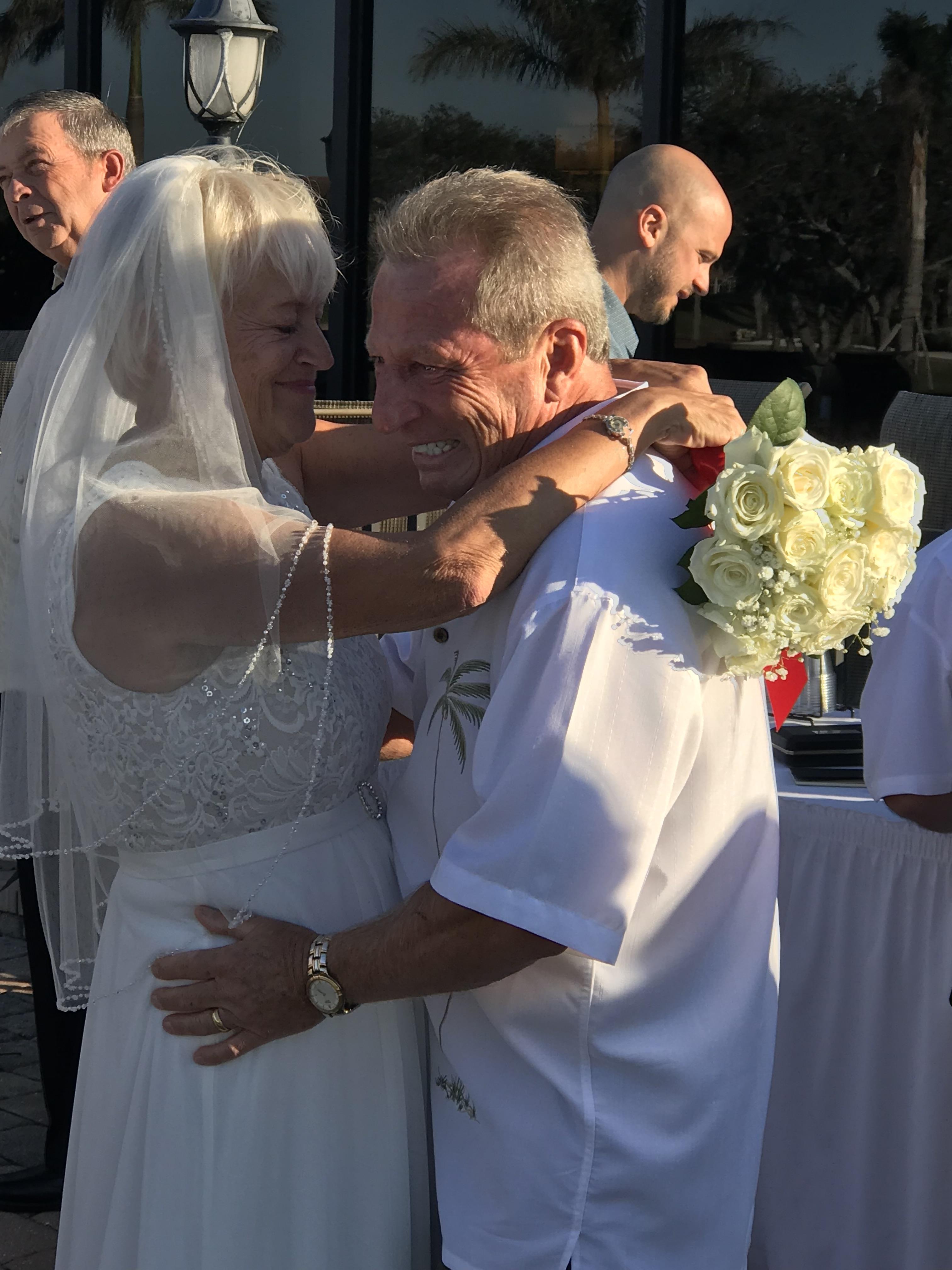 A man and woman hugging