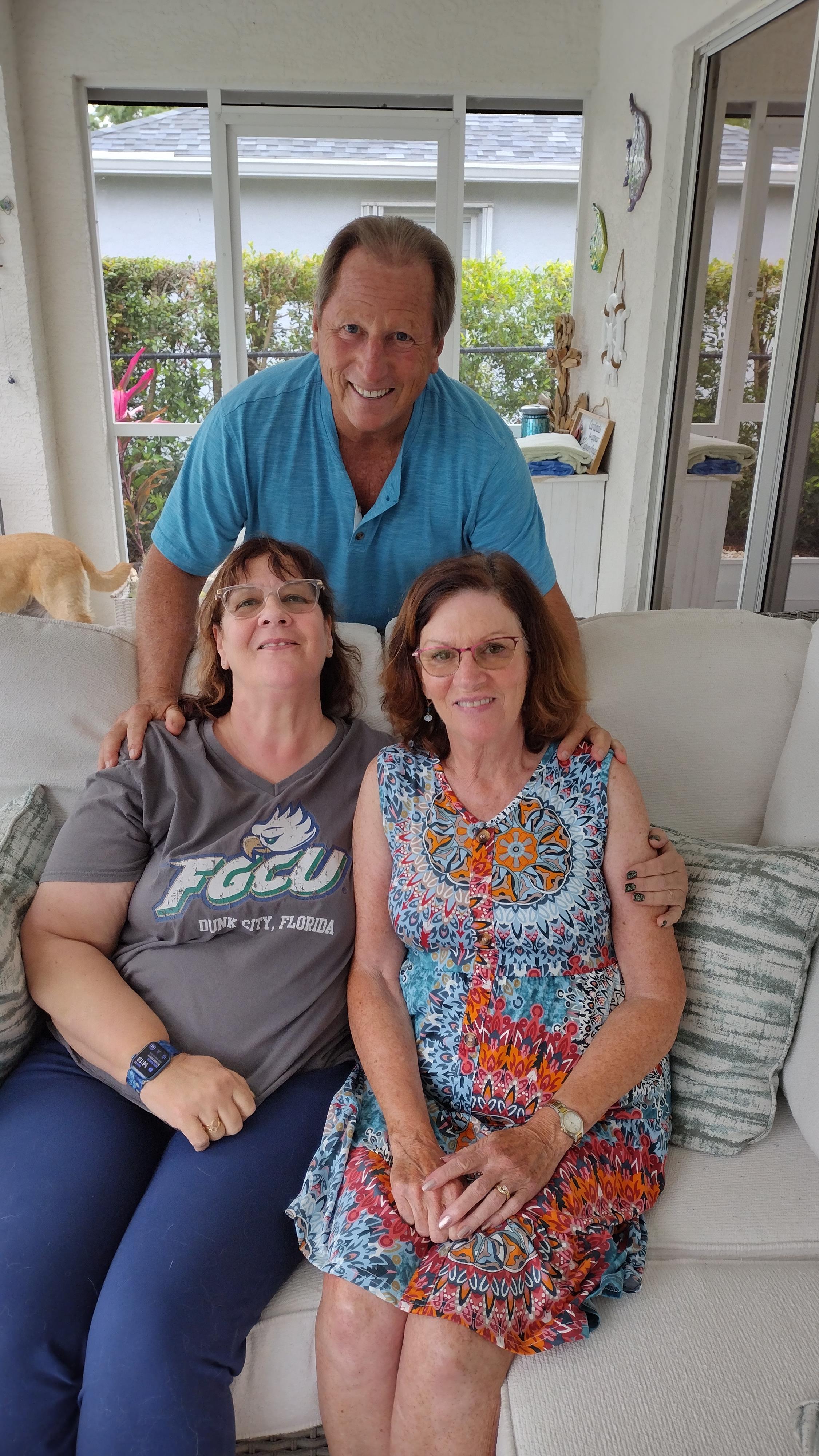 A group of people sitting on a couch