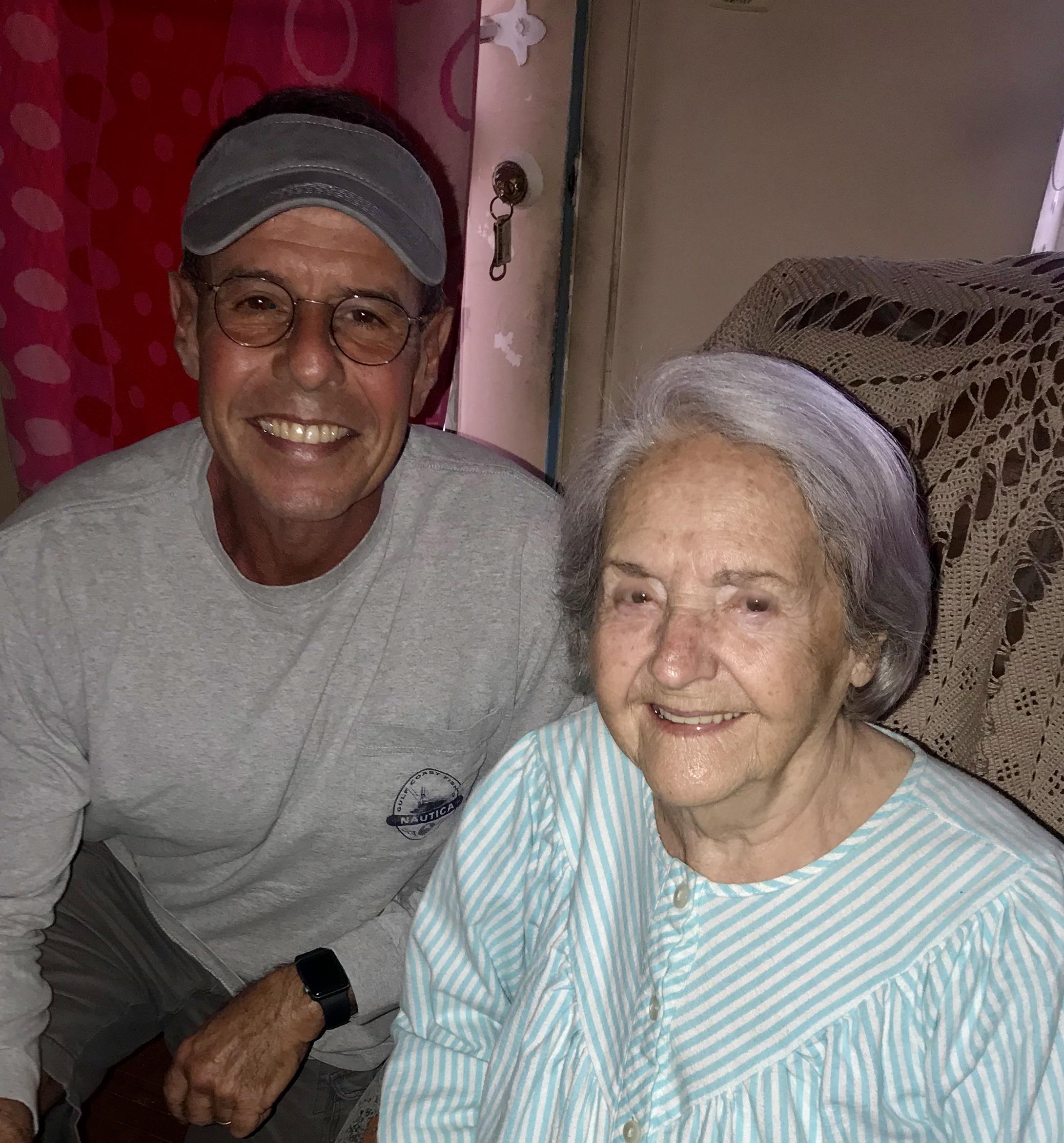 A man and woman sitting on a couch