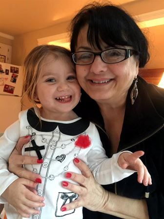 A woman holding a child