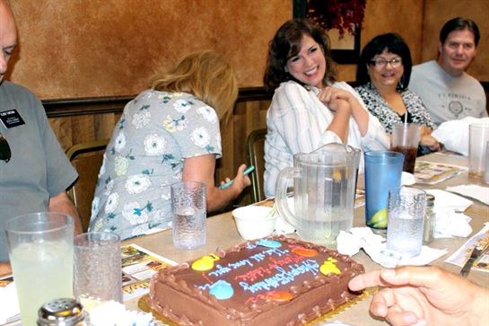 A group of women sitting at a table