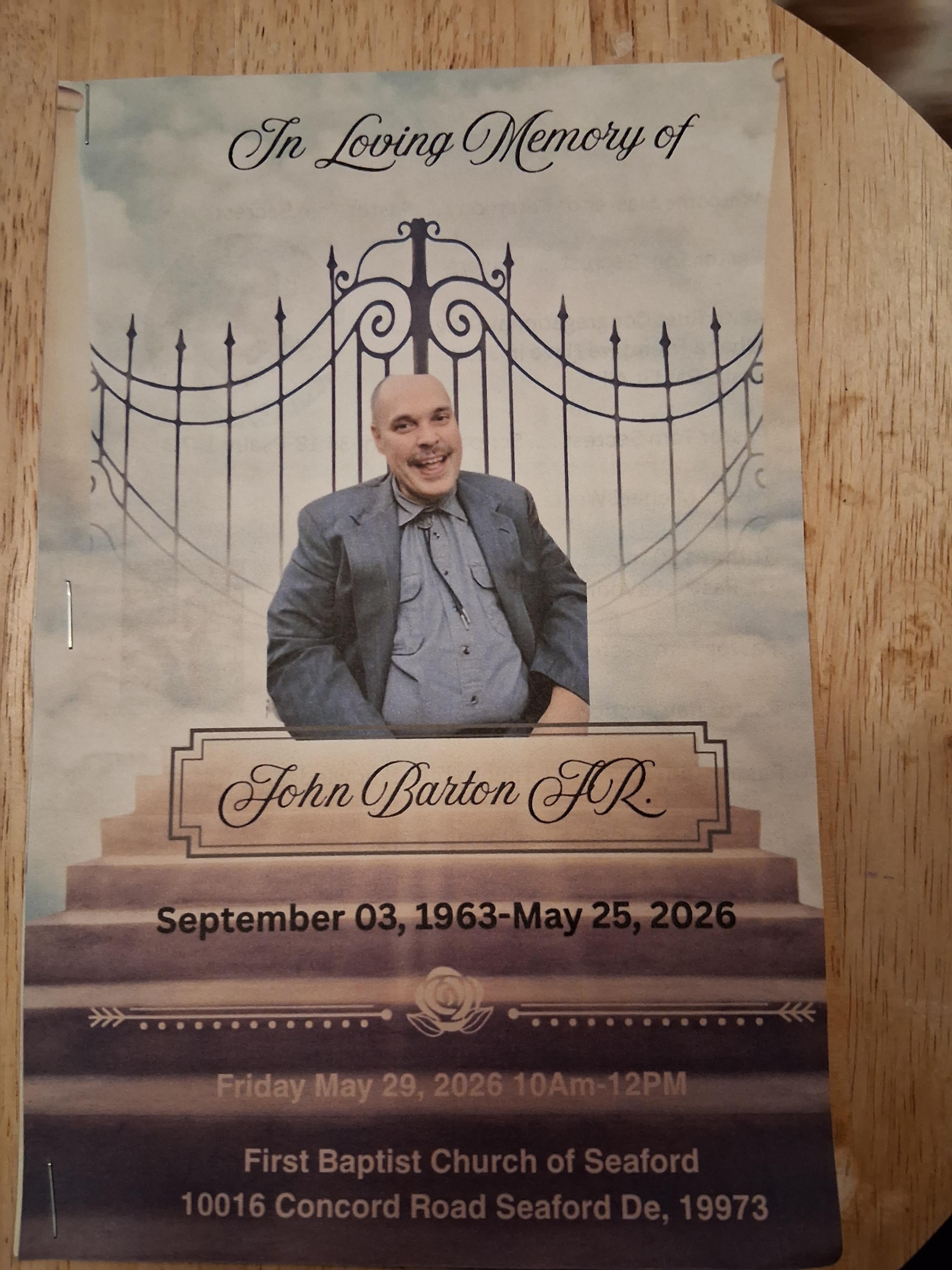 A poster of a man on a wooden surface