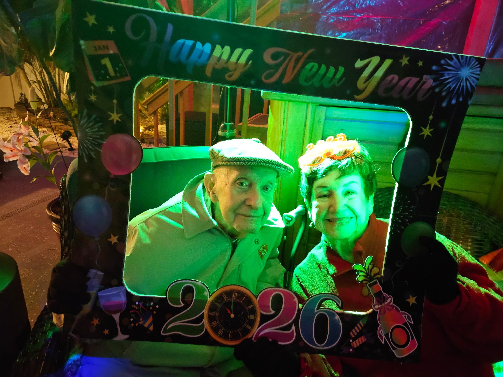 A man and woman taking a selfie