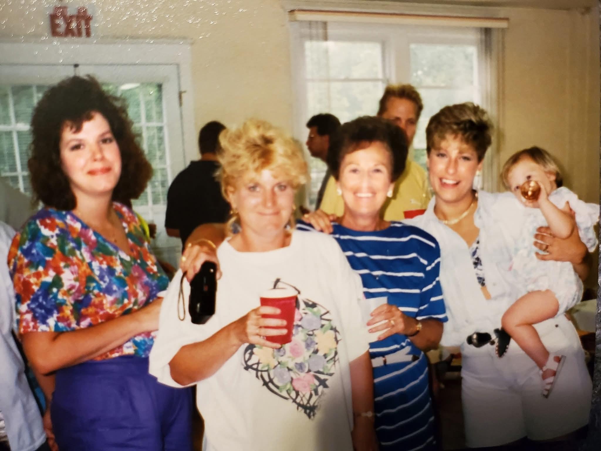 A group of women posing for a photo
