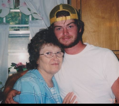 A man and woman posing for a picture