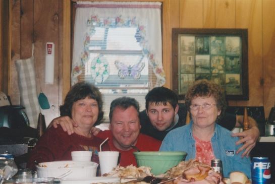 A group of people sitting at a table