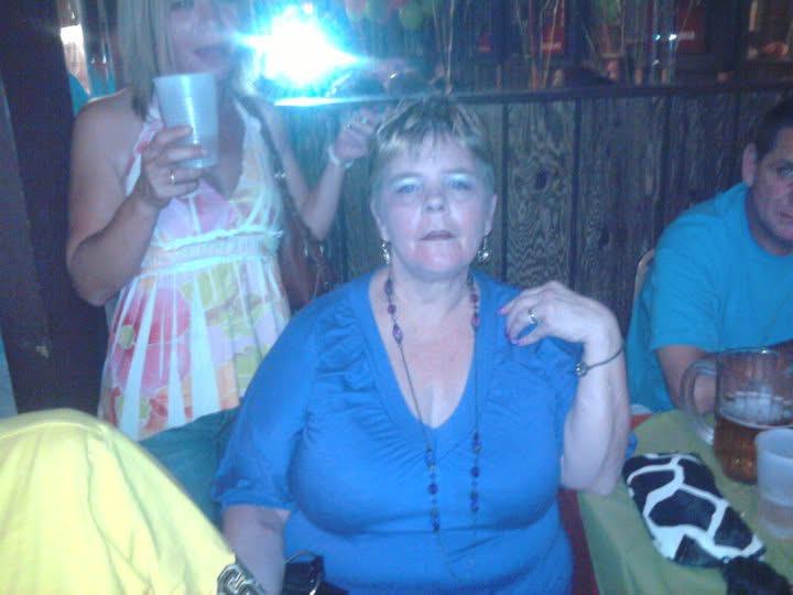 A woman in a blue shirt