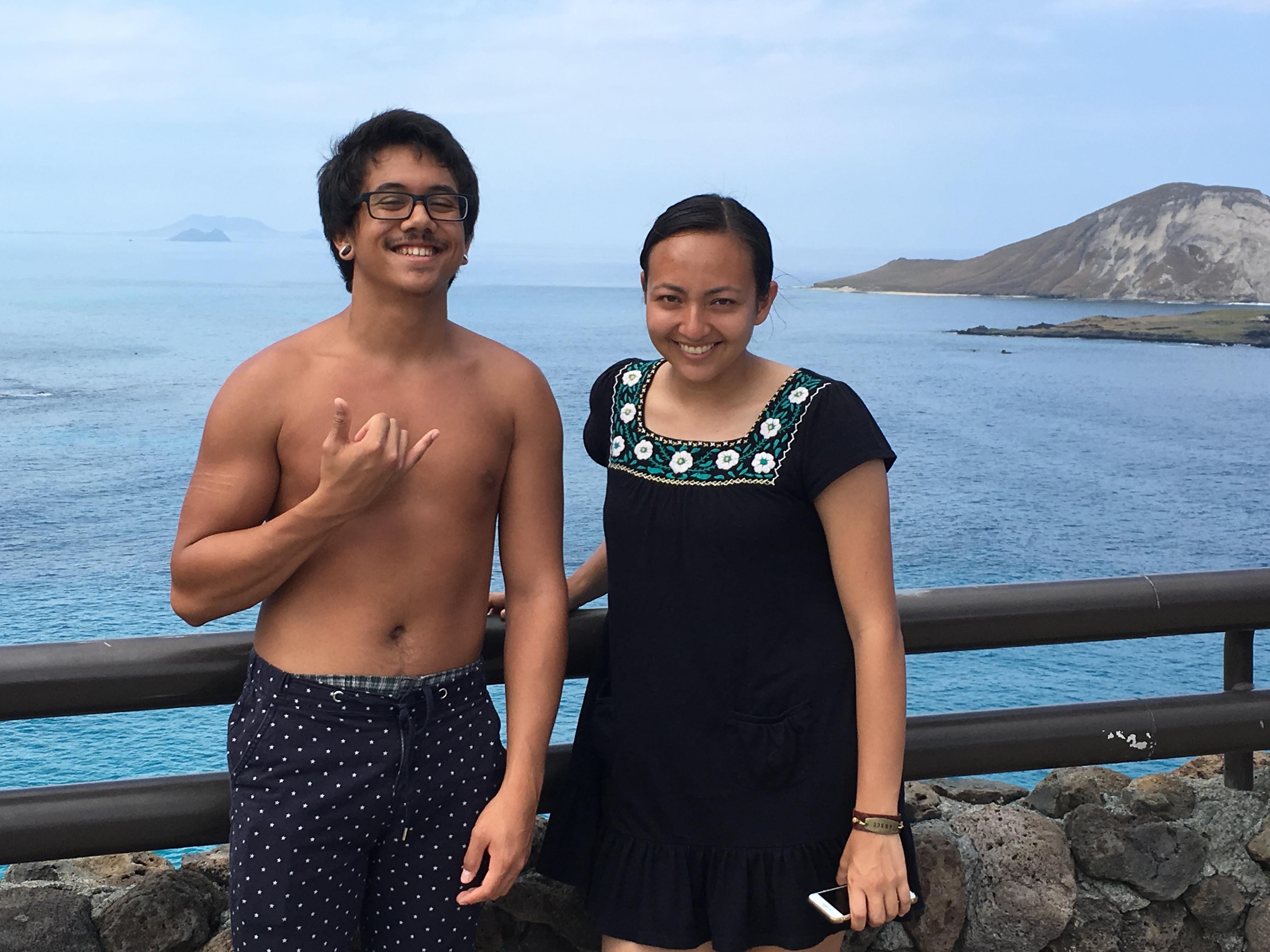 A man and woman posing for a picture