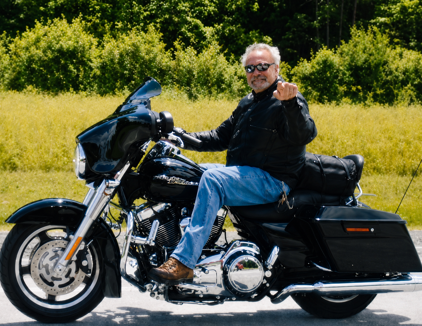 A man sitting on a motorcycle