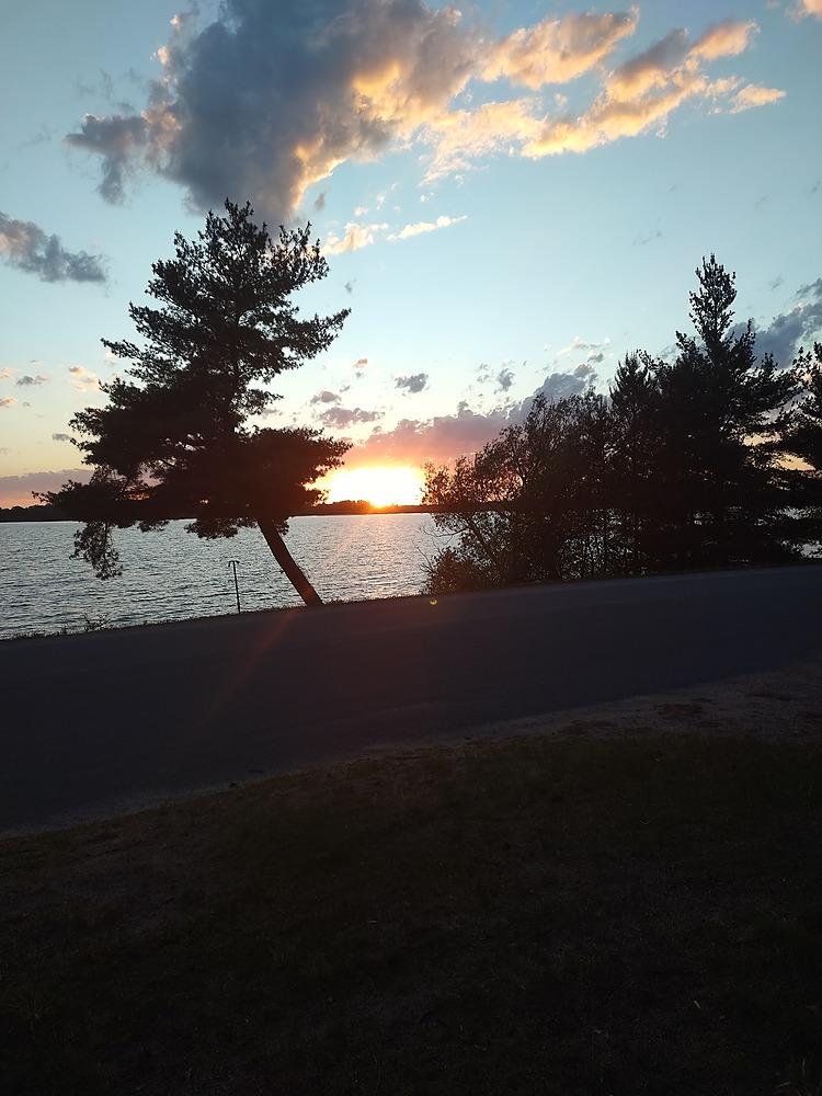 A sunset over a lake