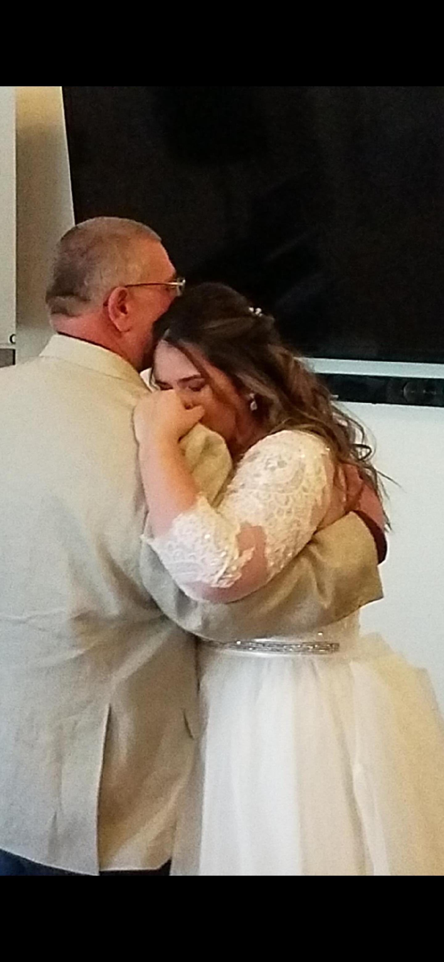 A man and woman hugging