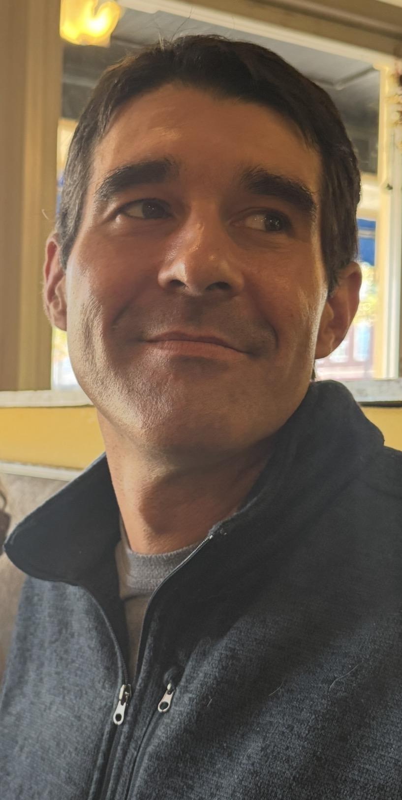 A man smiling for the camera