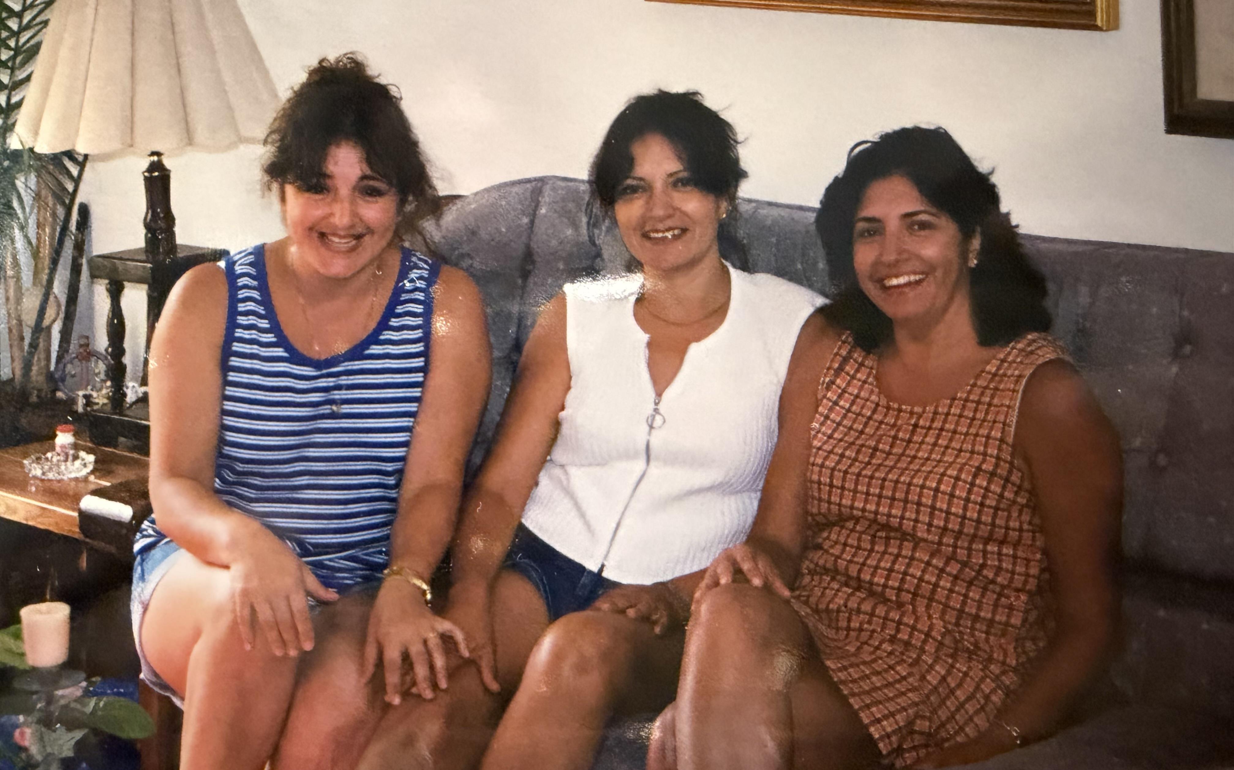 A group of women sitting on a couch