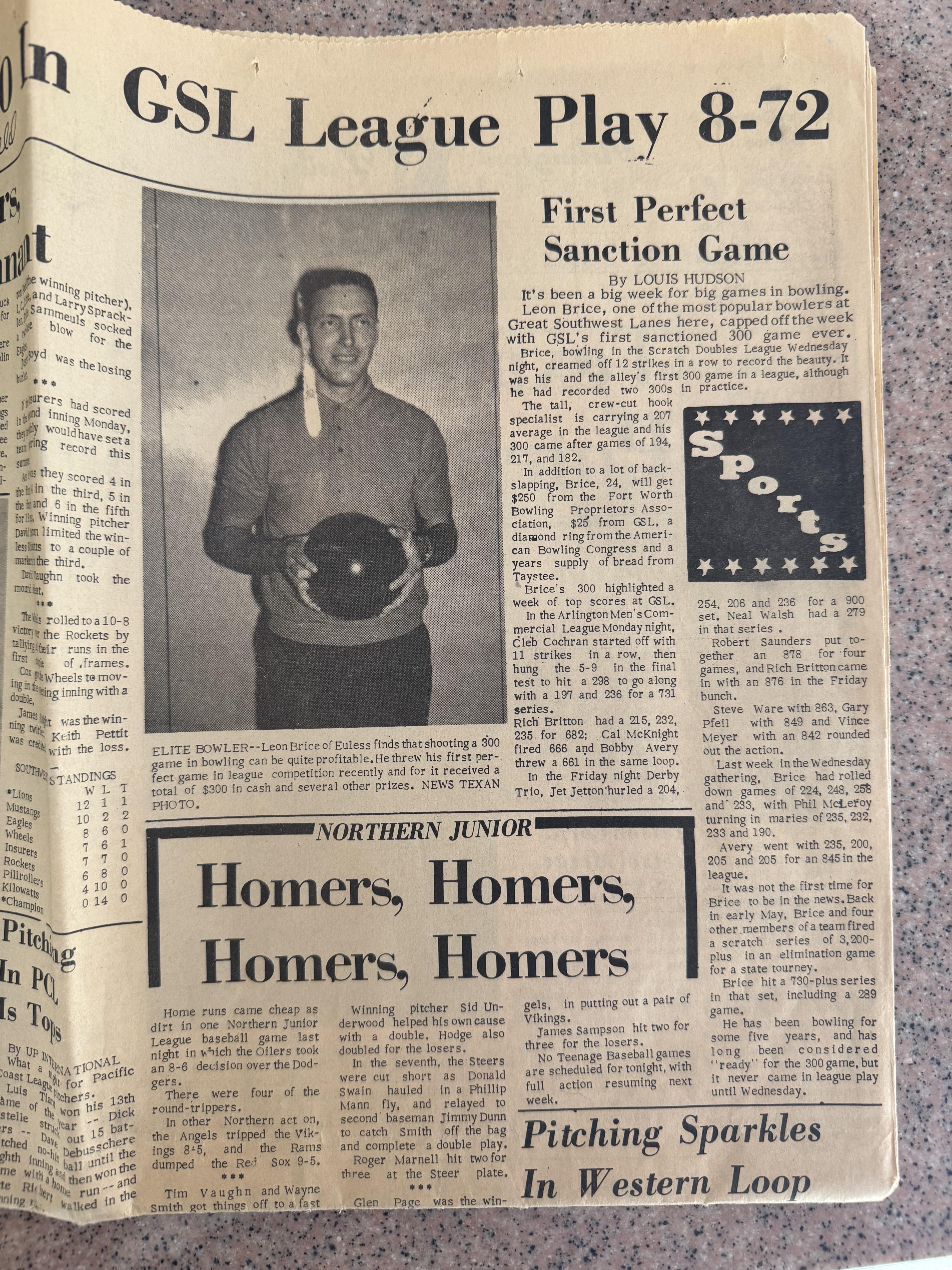 A newspaper with a man holding a bowling ball