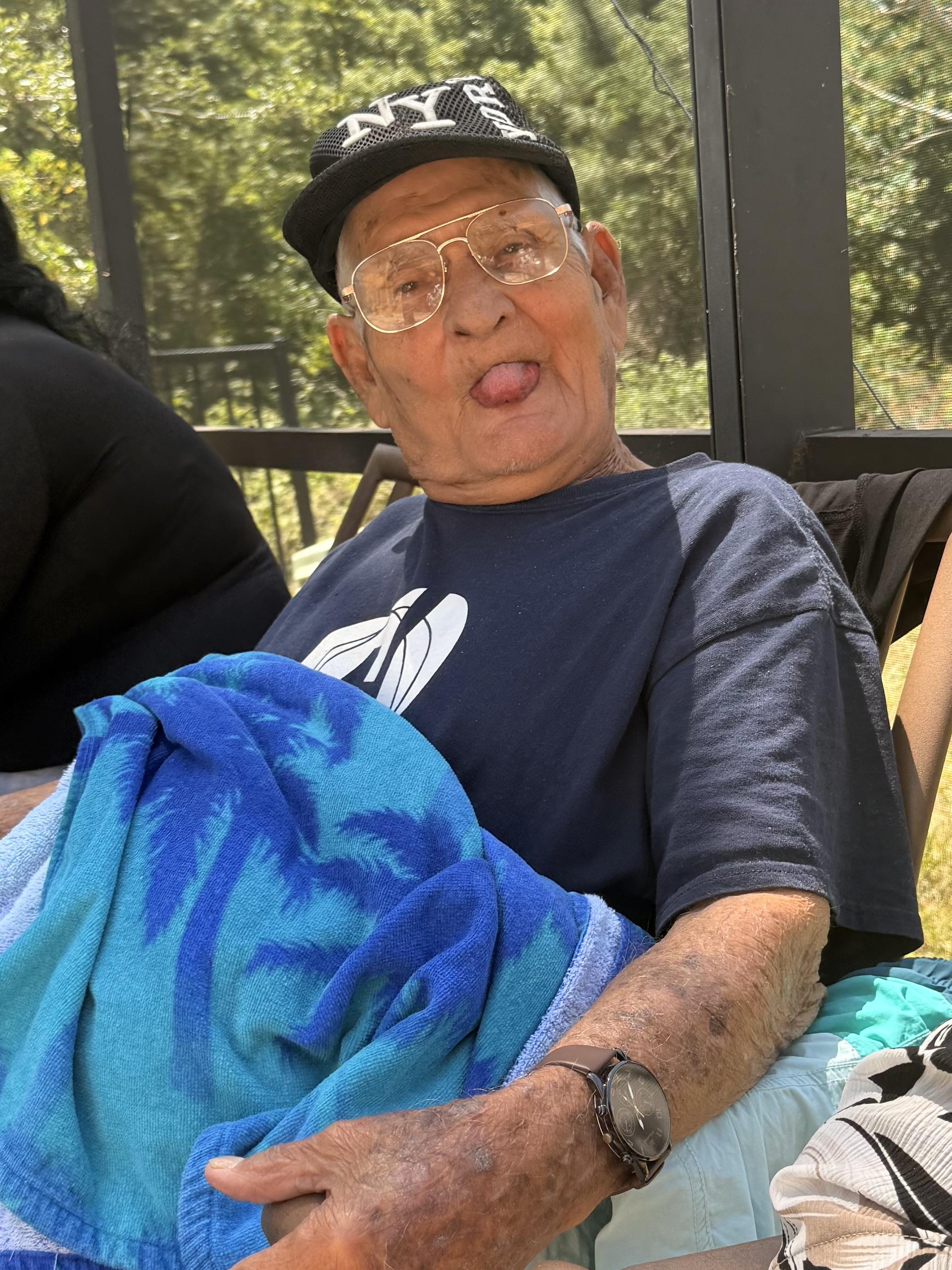 An old man sticking his tongue out