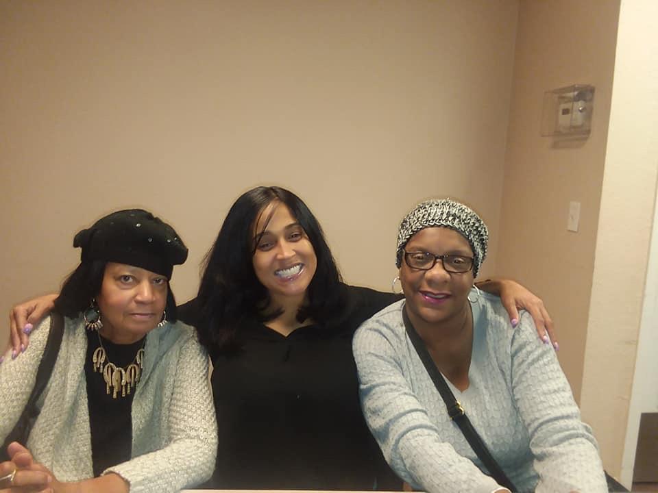 A group of women posing for a photo