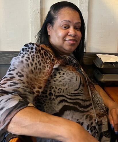 A woman sitting at a table