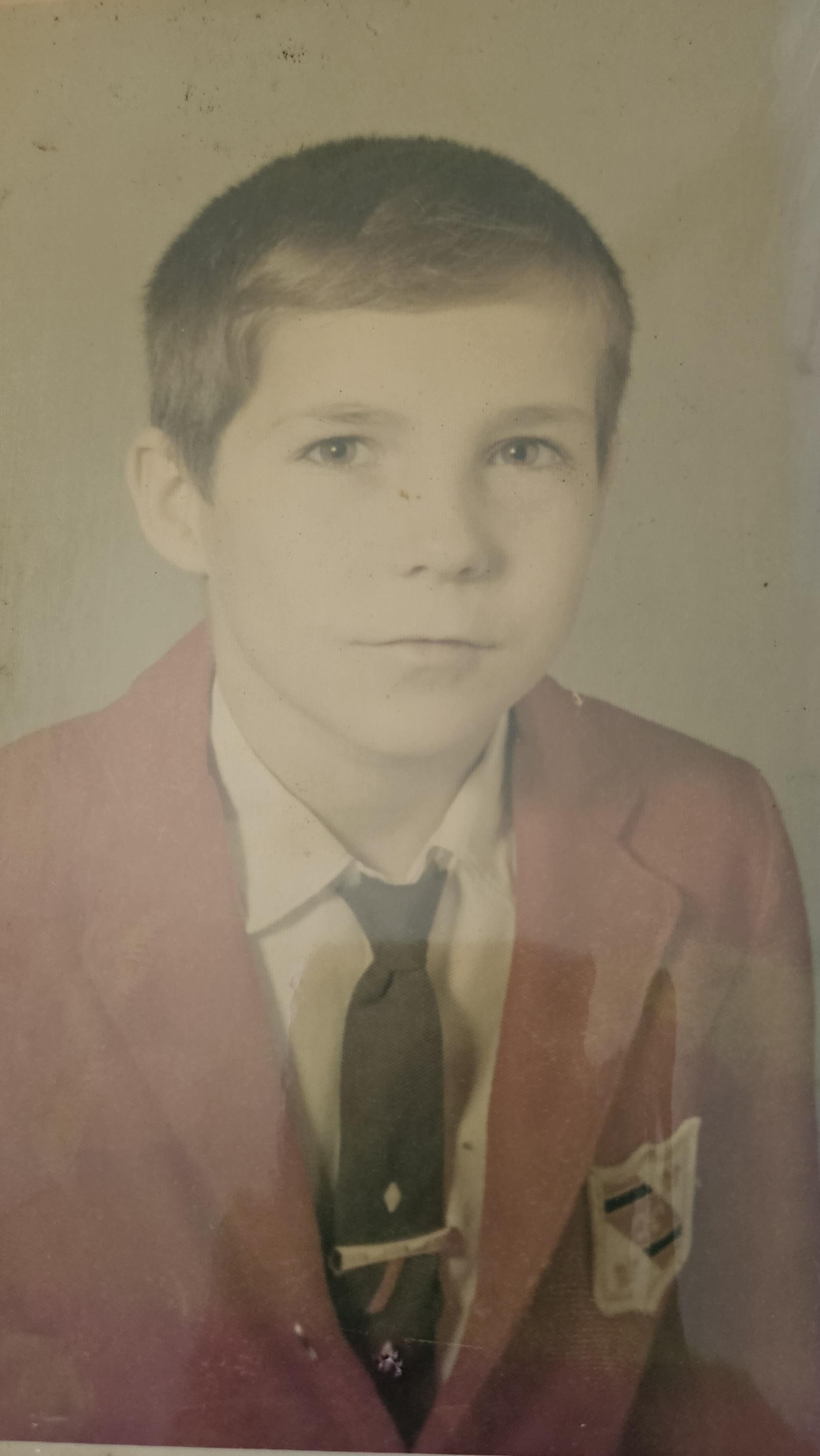 A boy in a suit and tie