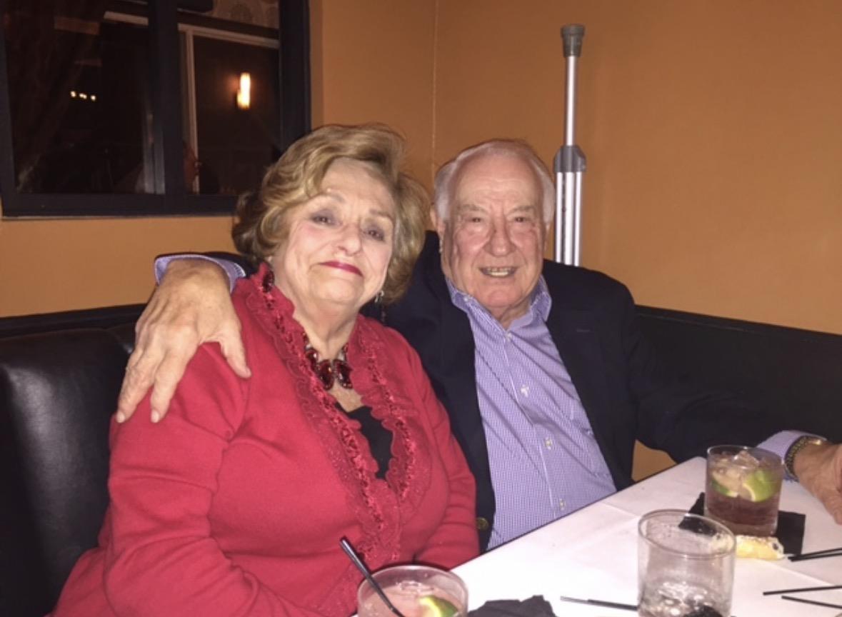 A man and woman sitting at a table
