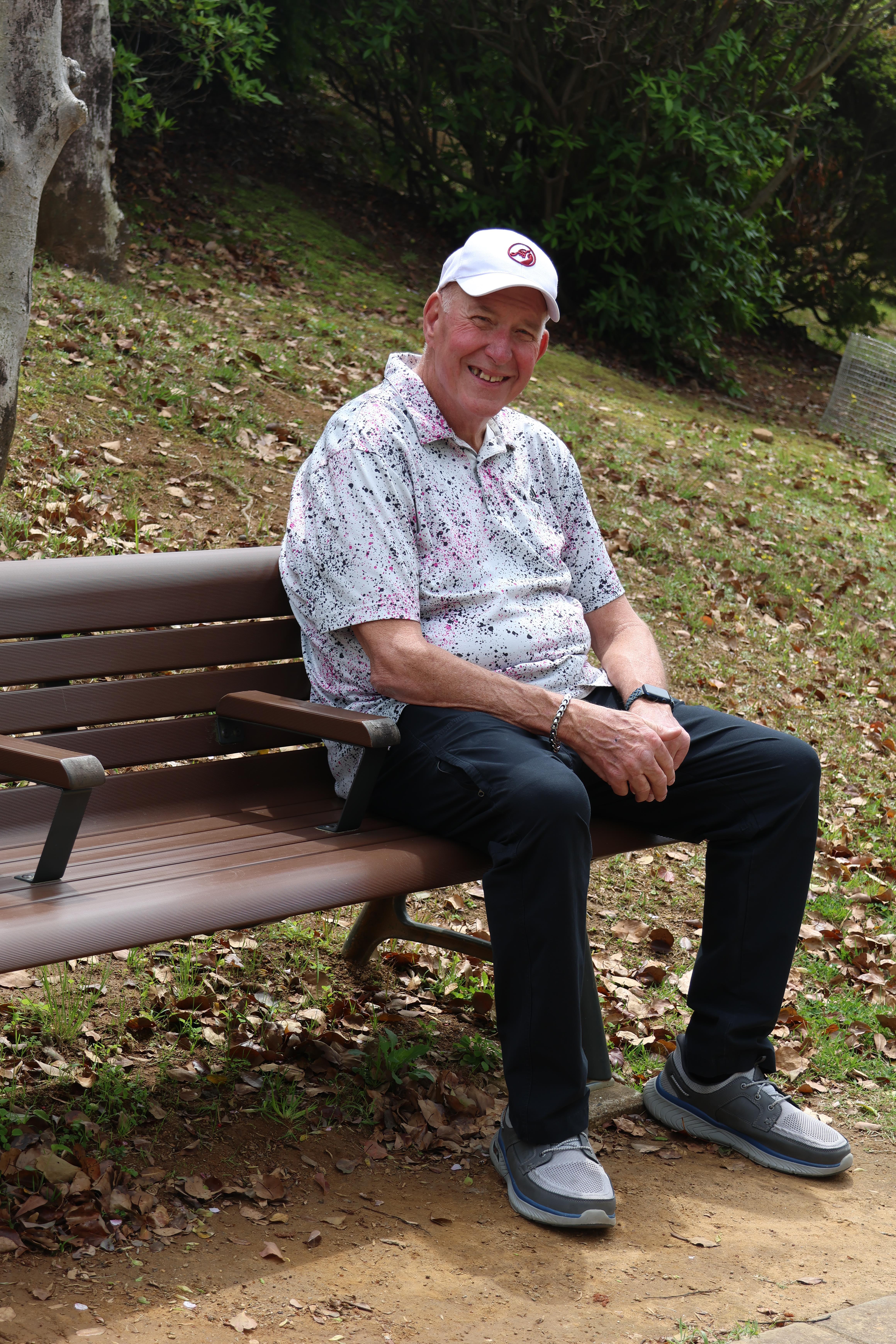 A man sitting on a bench