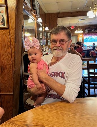 A man holding a baby